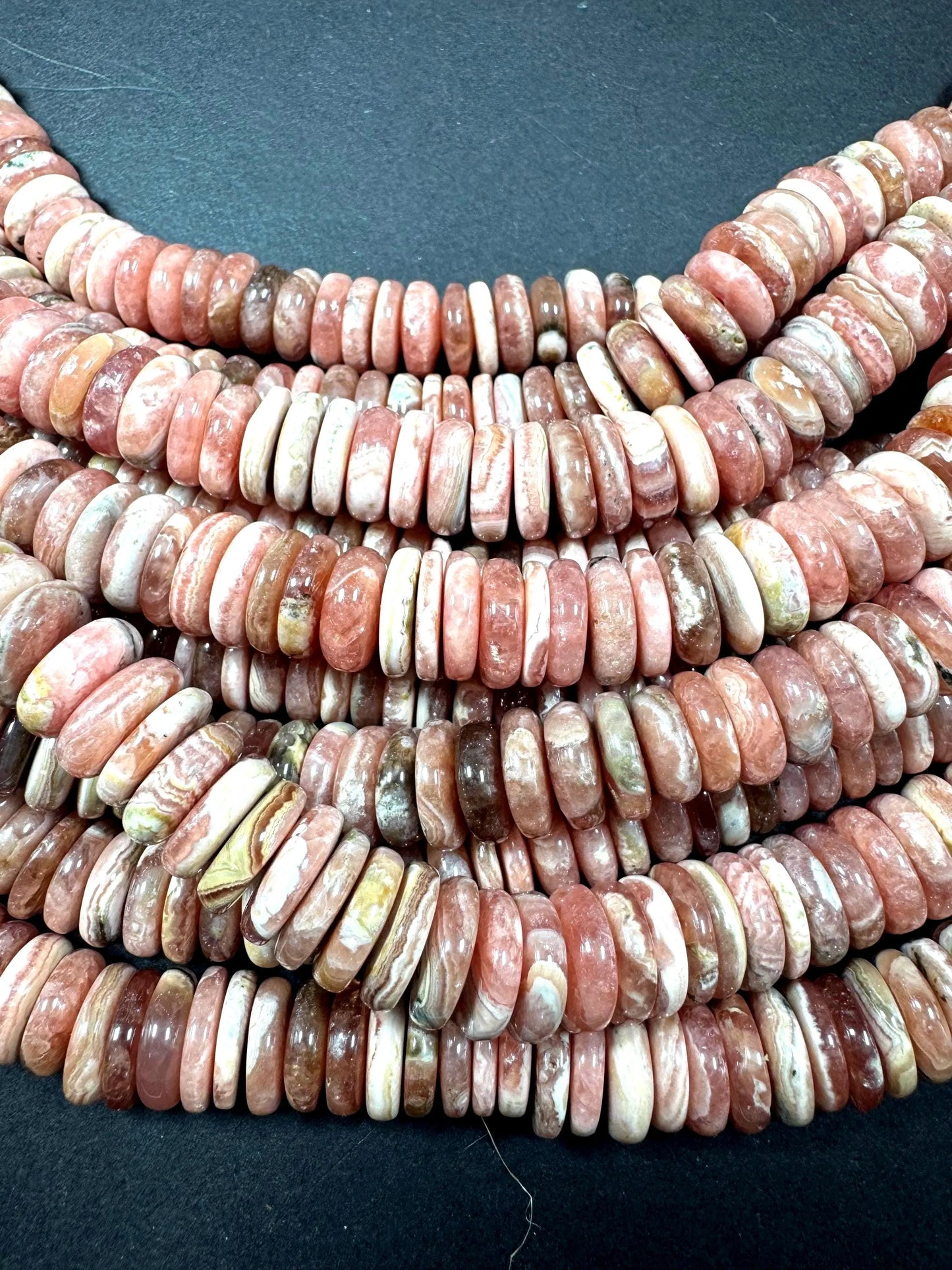 AAA RHODOCROSITE Gemstone bead. rondelle shape . gorgeous Natural Rose pink color . not treated. Excellent quality . full strand 15.5