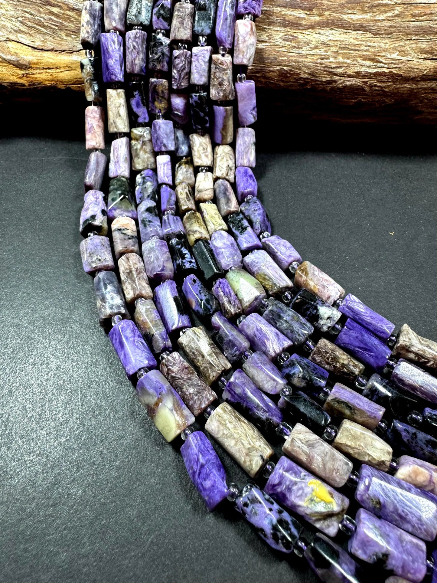 AA Natural Charoite gemstone bead. 8x12mm tube shape .beautiful Natural color. Excellent quality . full strand 15.5
