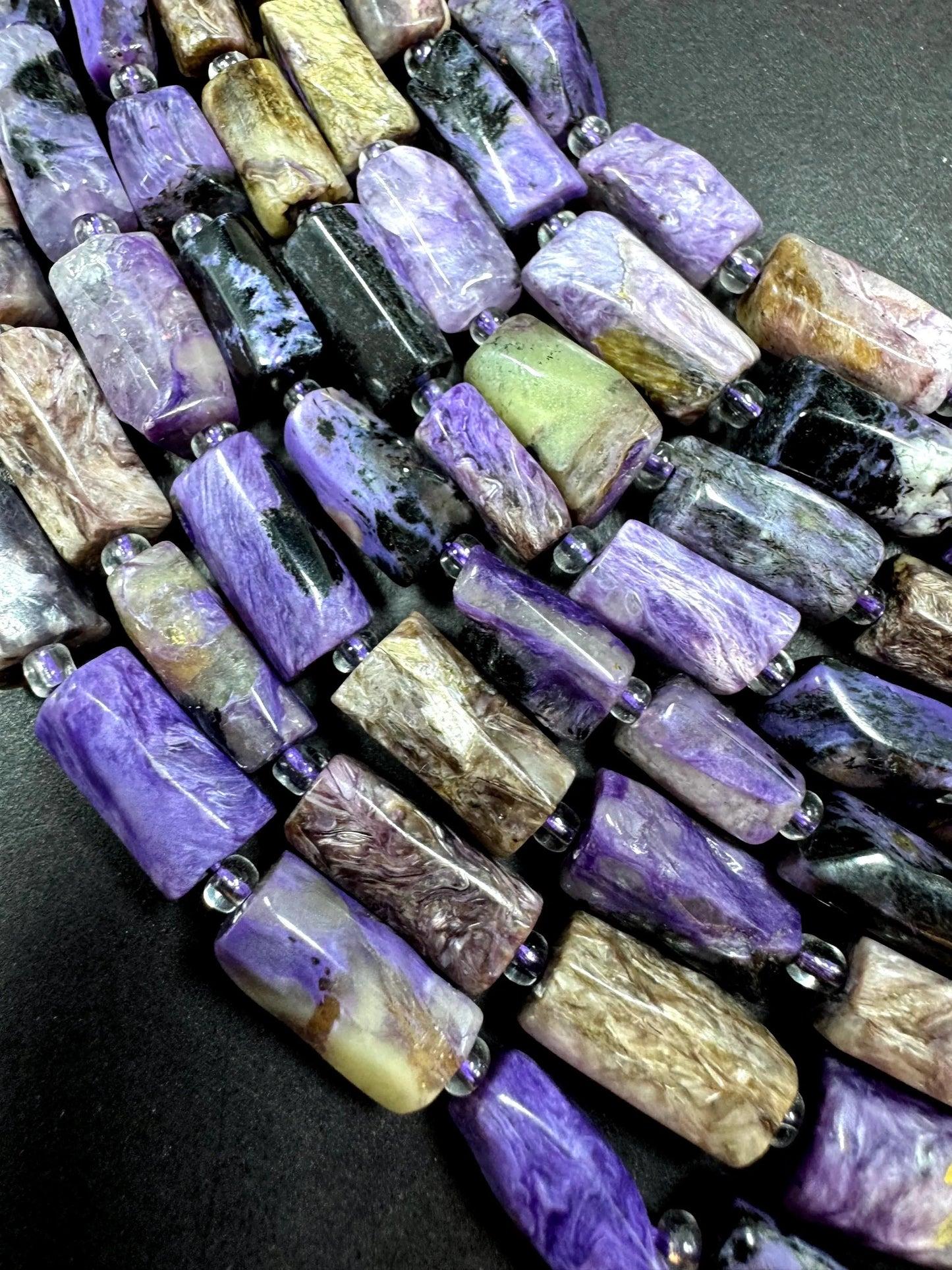 AA Natural Charoite gemstone bead. 8x12mm tube shape .beautiful Natural color. Excellent quality . full strand 15.5
