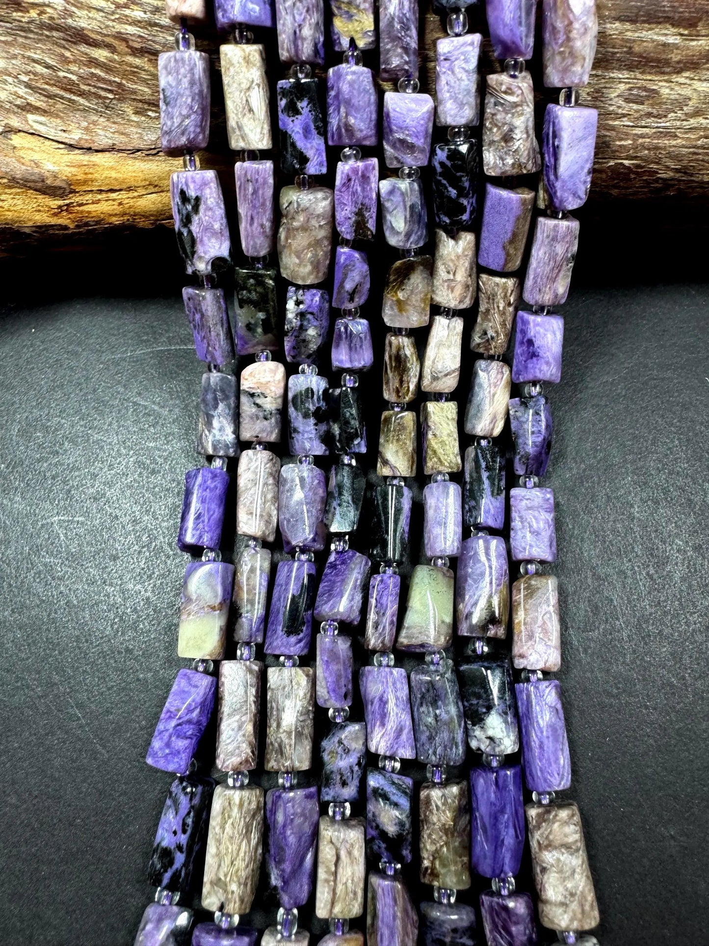 AA Natural Charoite gemstone bead. 8x12mm tube shape .beautiful Natural color. Excellent quality . full strand 15.5