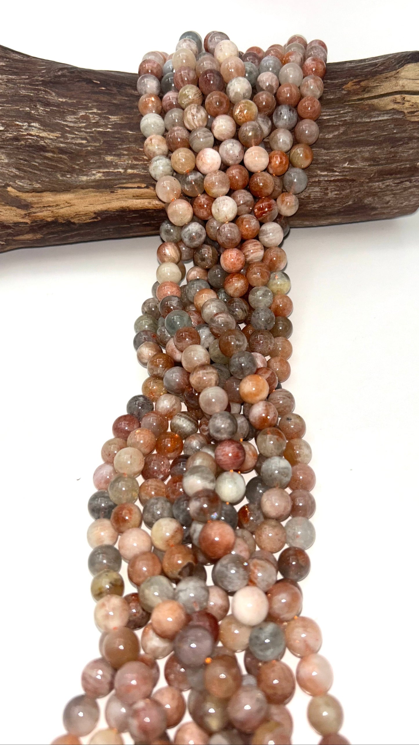 AAA Natural Silver sunstone bead. 6mm,8mm,10mm round smooth Gorgeous natural silver, dusty rose color . Stunning looking bead!