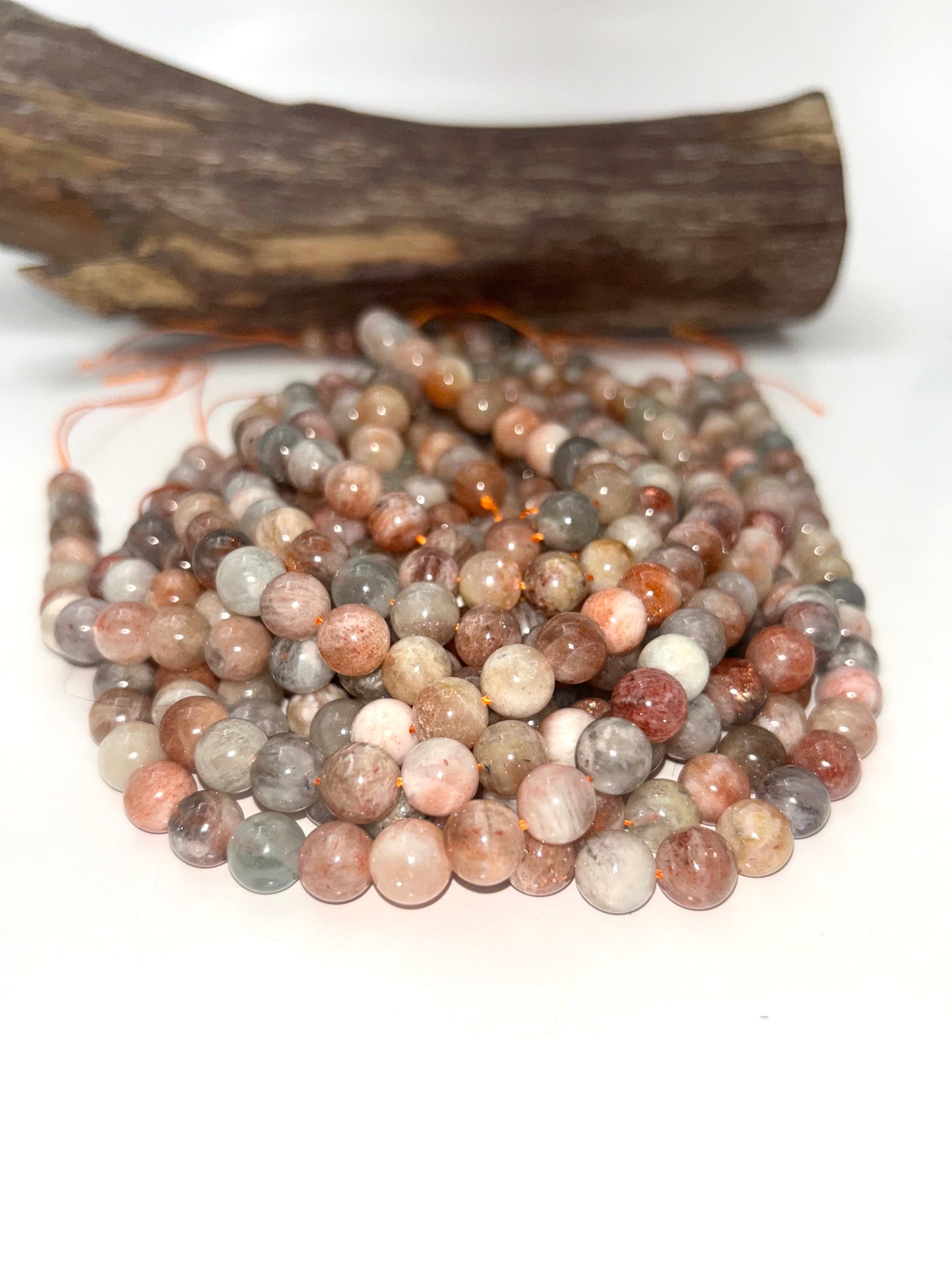 AAA Natural Silver sunstone bead. 6mm,8mm,10mm round smooth Gorgeous natural silver, dusty rose color . Stunning looking bead!