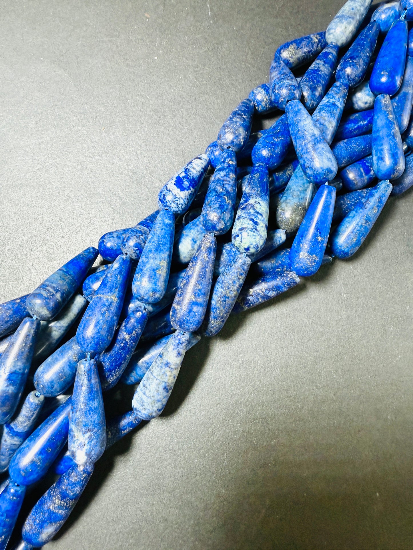 AAA 100% Natural lapis lazuli stone bead, 30x10mm Teardrop Shape Beads. Gorgeous natural blue lapis lazuli gemstone bead. Full strand 15.5”