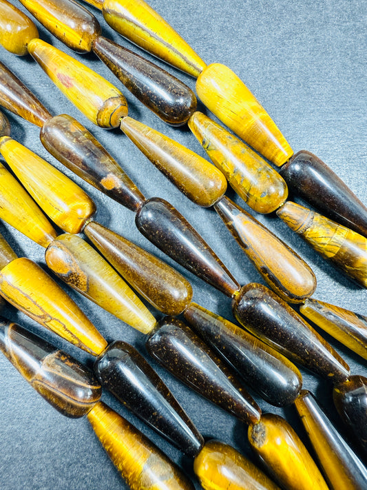 Natural Tiger eye stone bead. 30x10mm Teardrop Shape bead. Gorgeous natural brown yellow color. Full Strand 15.5".