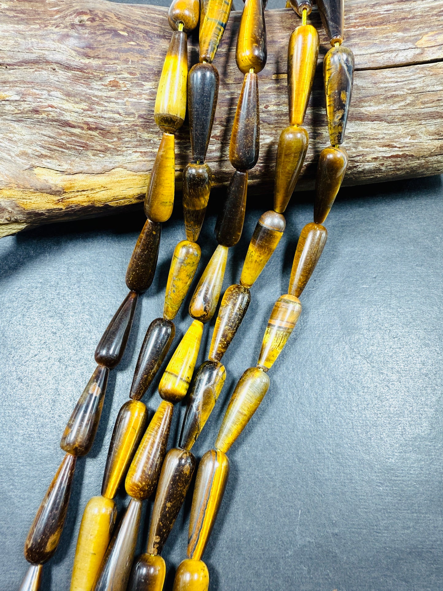 Natural Tiger eye stone bead. 30x10mm Teardrop Shape bead. Gorgeous natural brown yellow color. Full Strand 15.5".