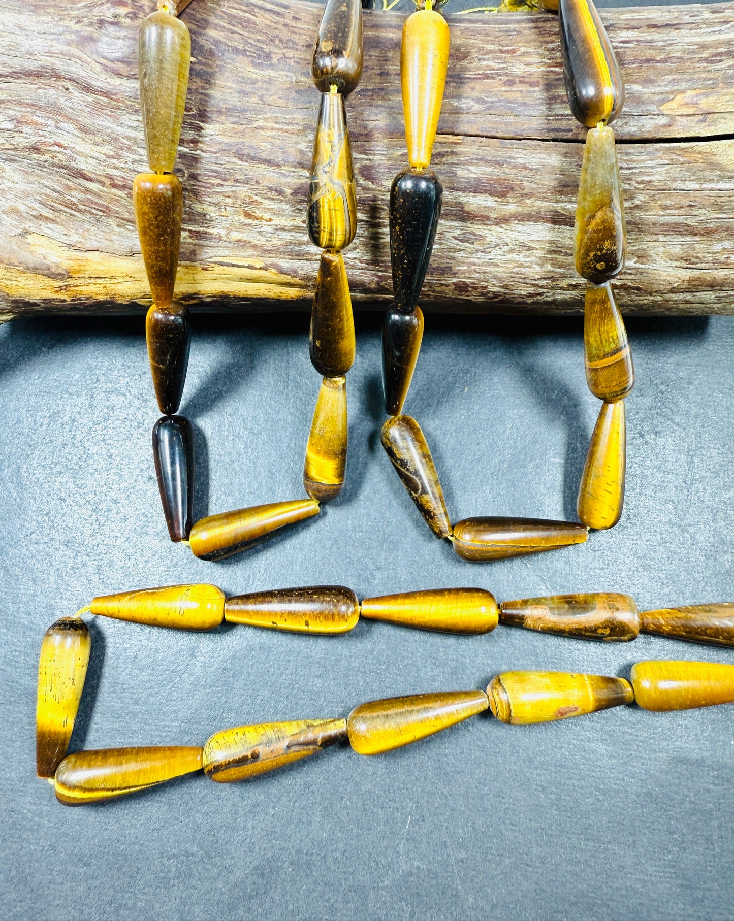 Natural Tiger eye stone bead. 30x10mm Teardrop Shape bead. Gorgeous natural brown yellow color. Full Strand 15.5".