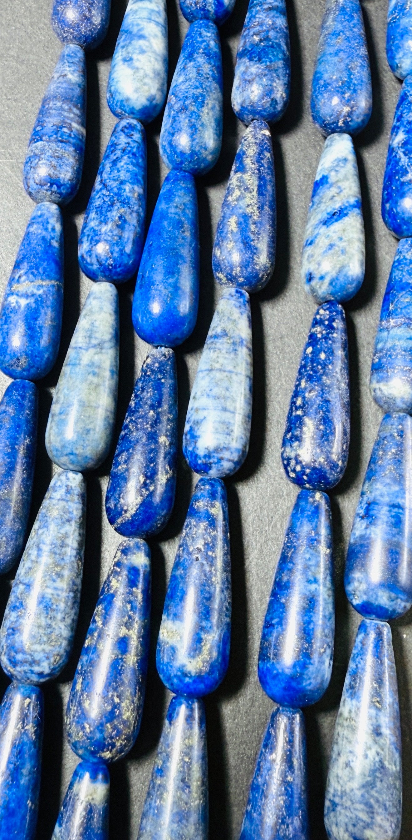 AAA 100% Natural lapis lazuli stone bead, 30x10mm Teardrop Shape Beads. Gorgeous natural blue lapis lazuli gemstone bead. Full strand 15.5”