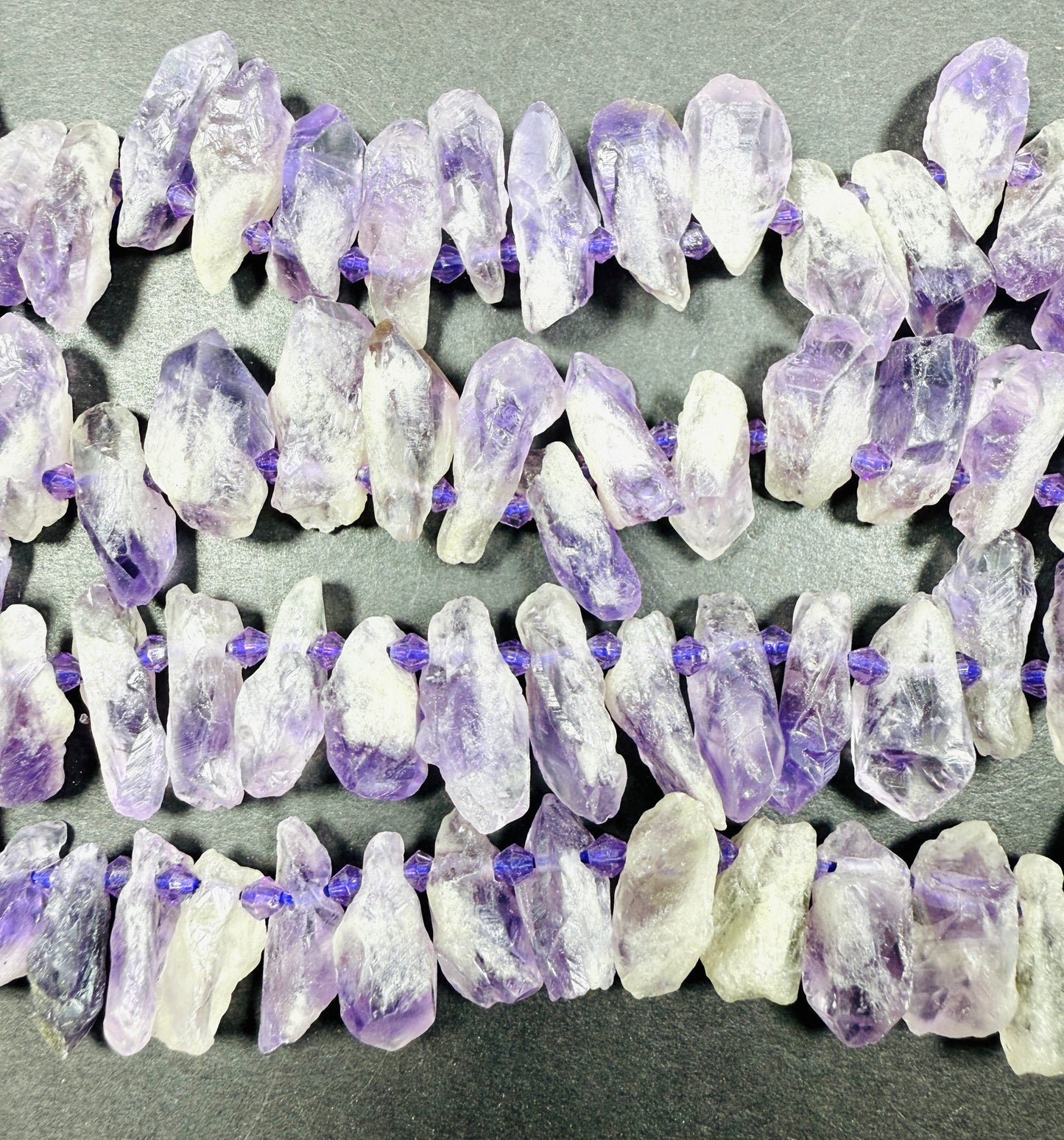 Natural Amethyst stone bead . Rough-cut teardrop shape bead 18mm. Gorgeous natural purple lavender color. Full strand 15.5”