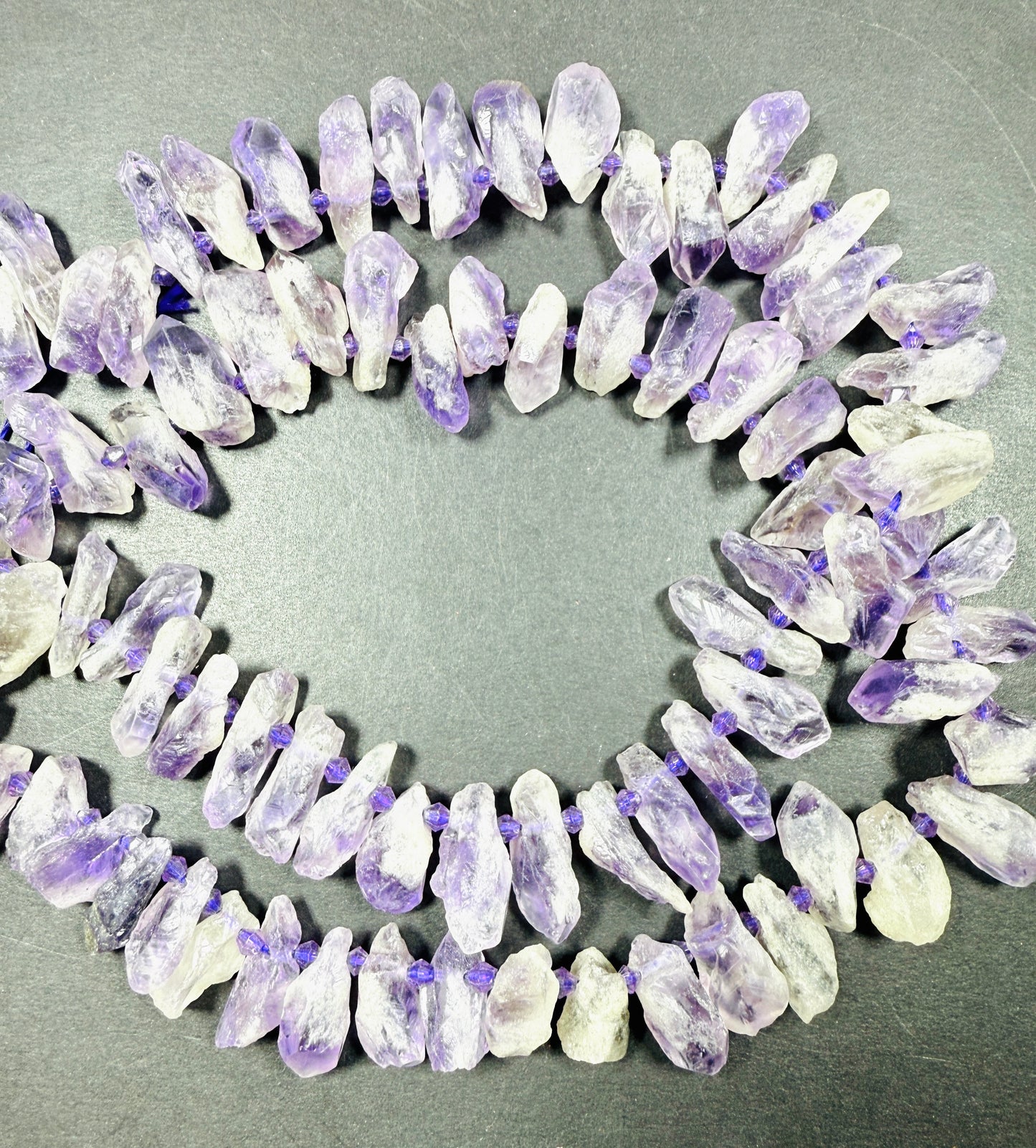 Natural Amethyst stone bead . Rough-cut teardrop shape bead 18mm. Gorgeous natural purple lavender color. Full strand 15.5”