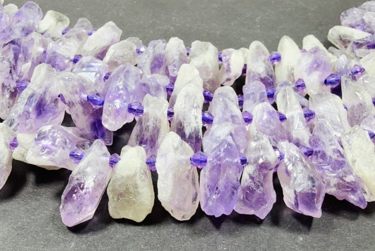 Natural Amethyst stone bead . Rough-cut teardrop shape bead 18mm. Gorgeous natural purple lavender color. Full strand 15.5”