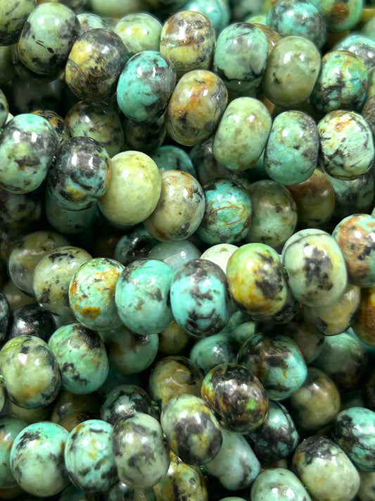 AAA Natural African turquoise smooth roundel stone bead. 6 x 4.5 mm bead . Gorgeous natural turquoise green blue with black points Gemstone,