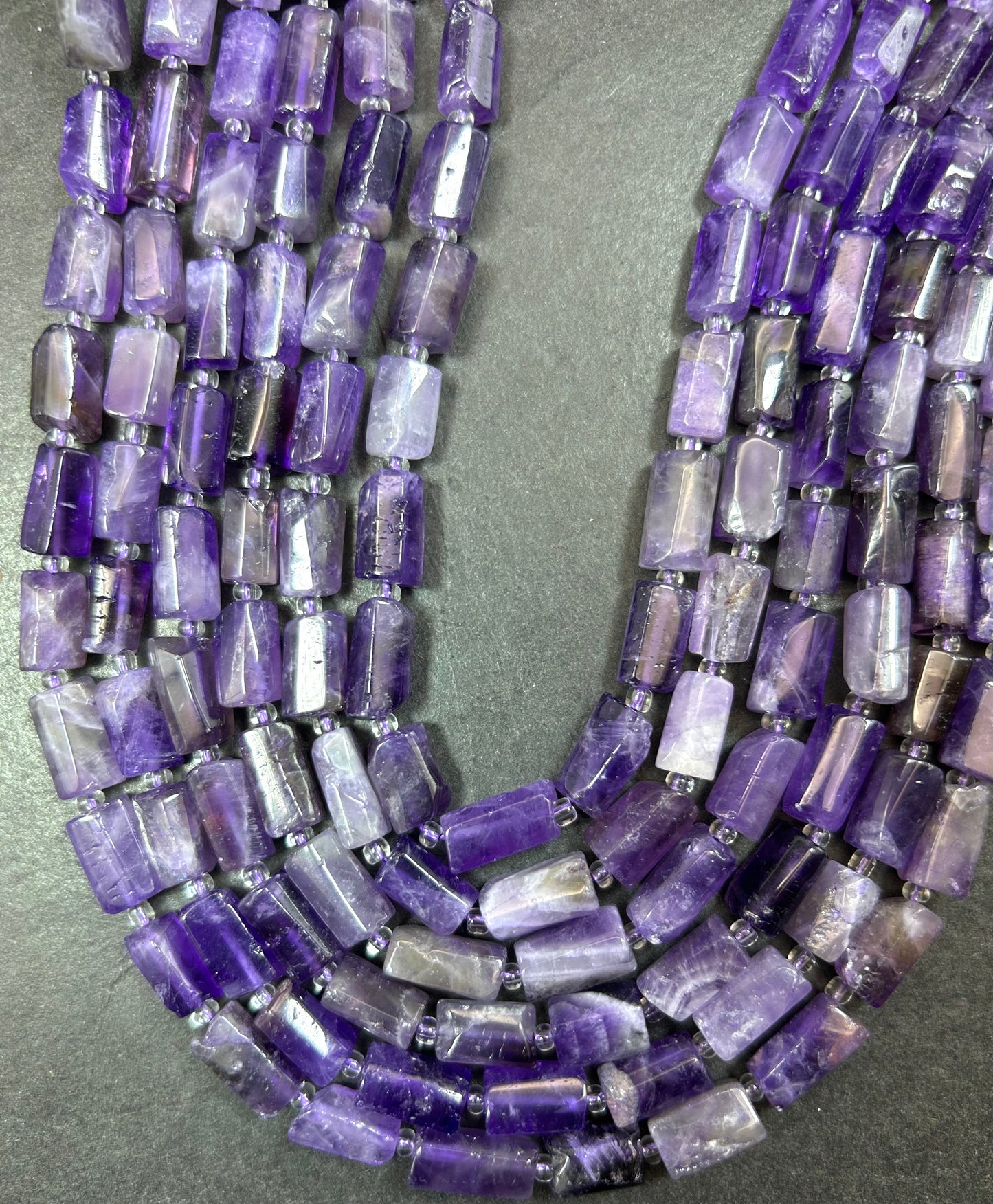 AAA Natural Amethyst stone bead. Faceted 6-7 x 9-12mm tube shape. Gorgeous natural purple Amethyst. Nice quality gemstone