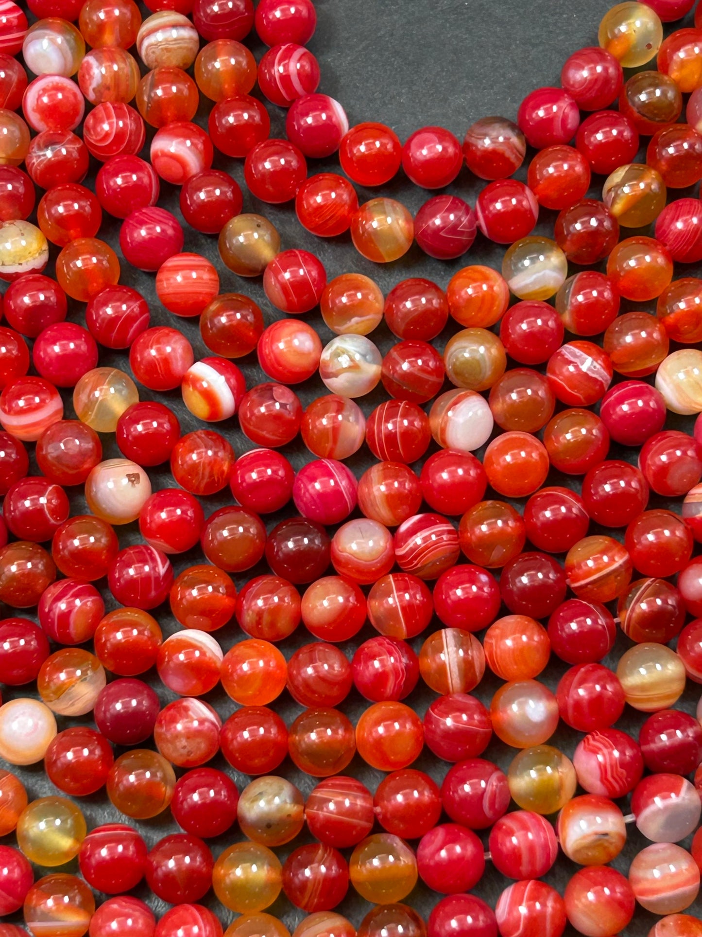 Beautiful natural Crimson Botswana stone bead.8mm smooth round bead. Beautiful natural red orange color Botswana gemstone. Full strand 15