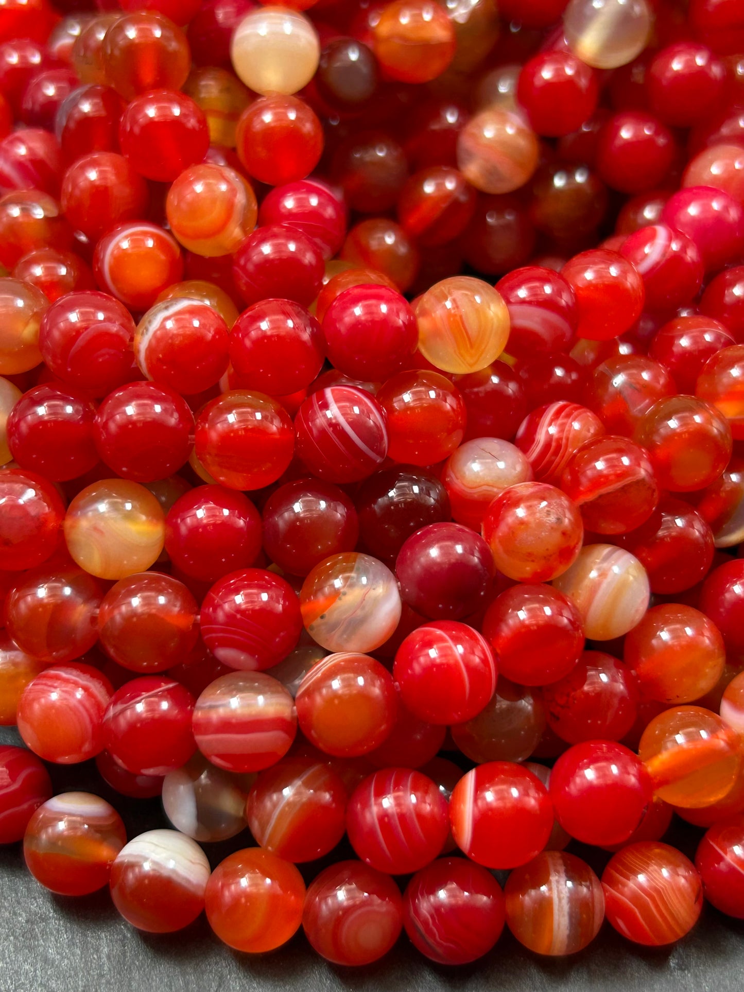 Beautiful natural Crimson Botswana stone bead.8mm smooth round bead. Beautiful natural red orange color Botswana gemstone. Full strand 15
