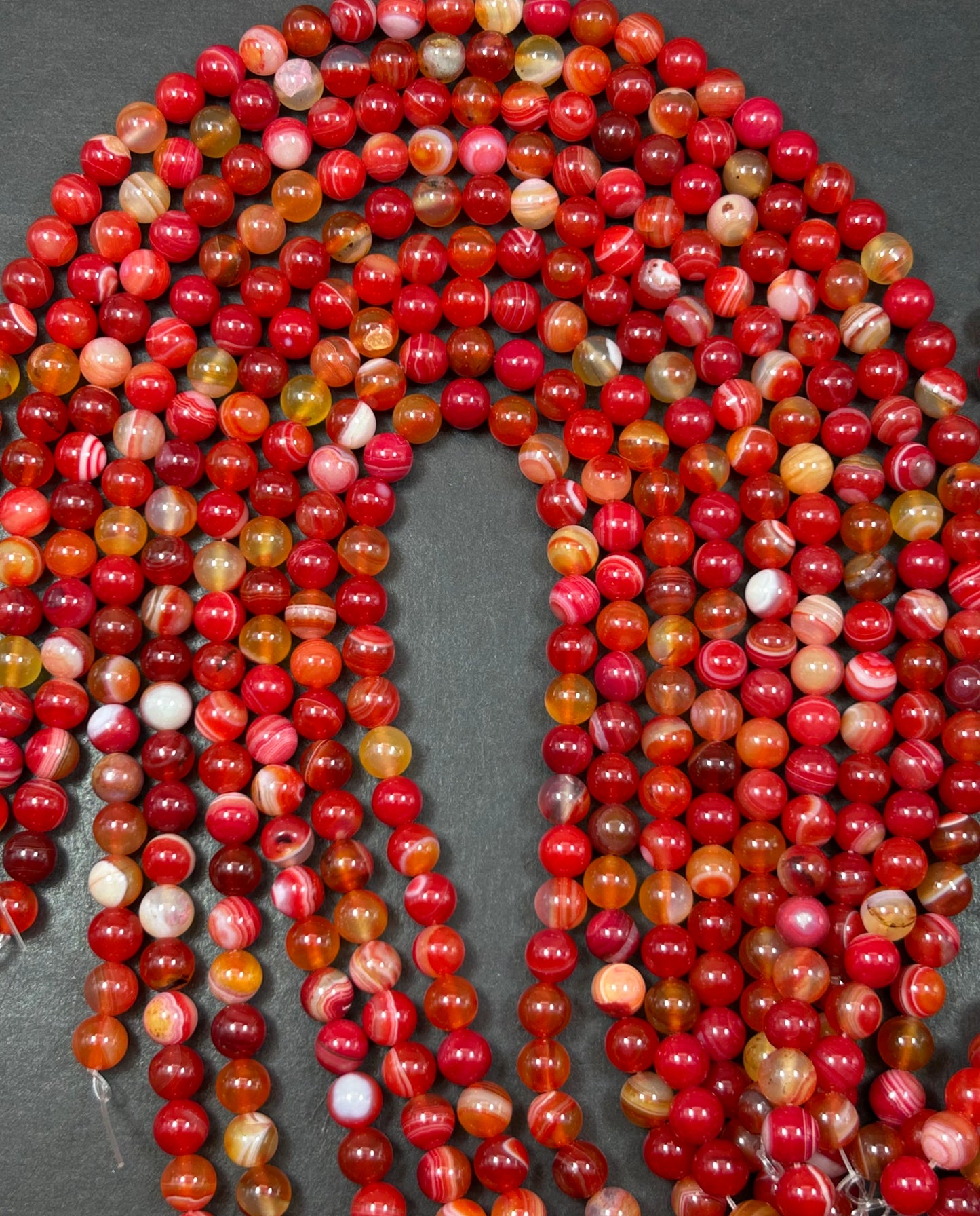 Beautiful natural Crimson Botswana stone bead.8mm smooth round bead. Beautiful natural red orange color Botswana gemstone. Full strand 15