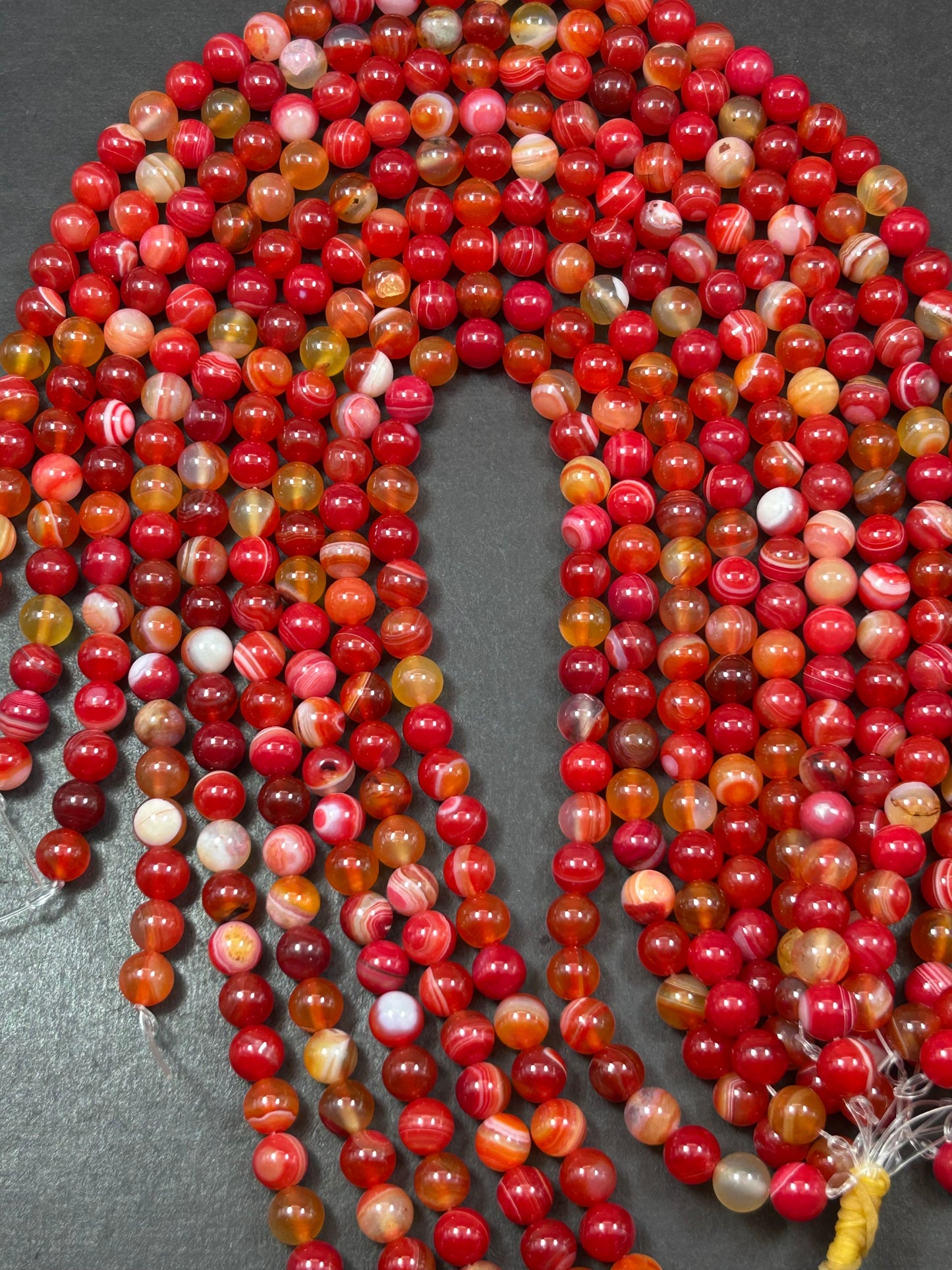 Beautiful natural Crimson Botswana stone bead.8mm smooth round bead. Beautiful natural red orange color Botswana gemstone. Full strand 15