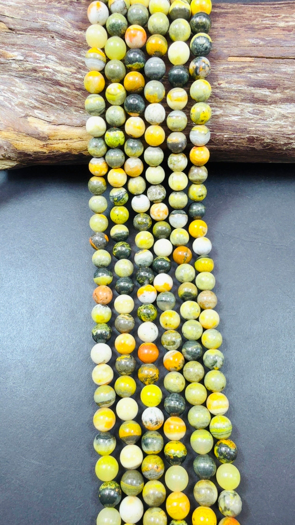 AAA Natural Eclipse stone. 6mm 8mm 10mm round bead . Beautiful natural yellow bee color with brown. High quality Eclipse stone.