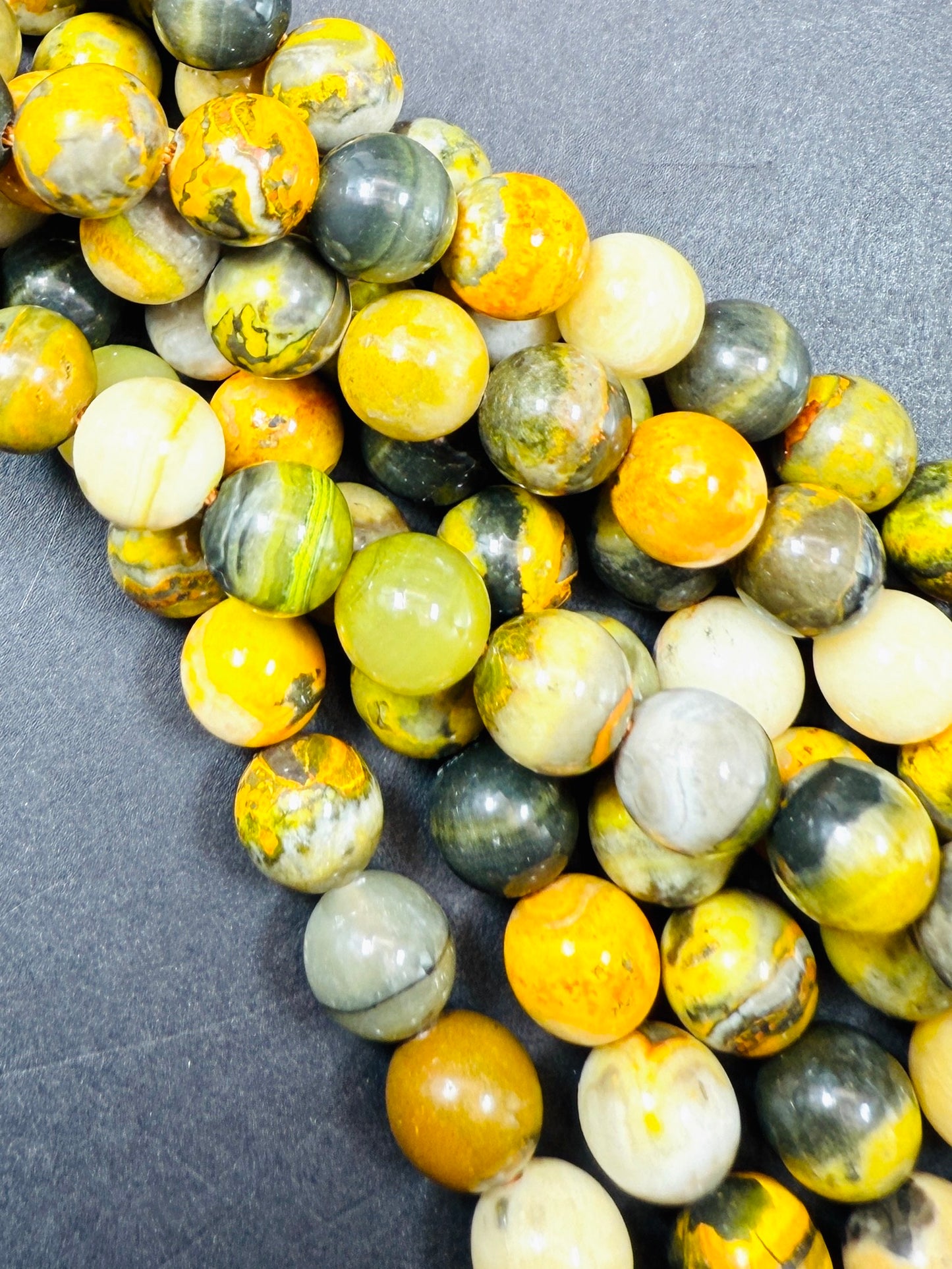 AAA Natural Eclipse stone. 6mm 8mm 10mm round bead . Beautiful natural yellow bee color with brown. High quality Eclipse stone.