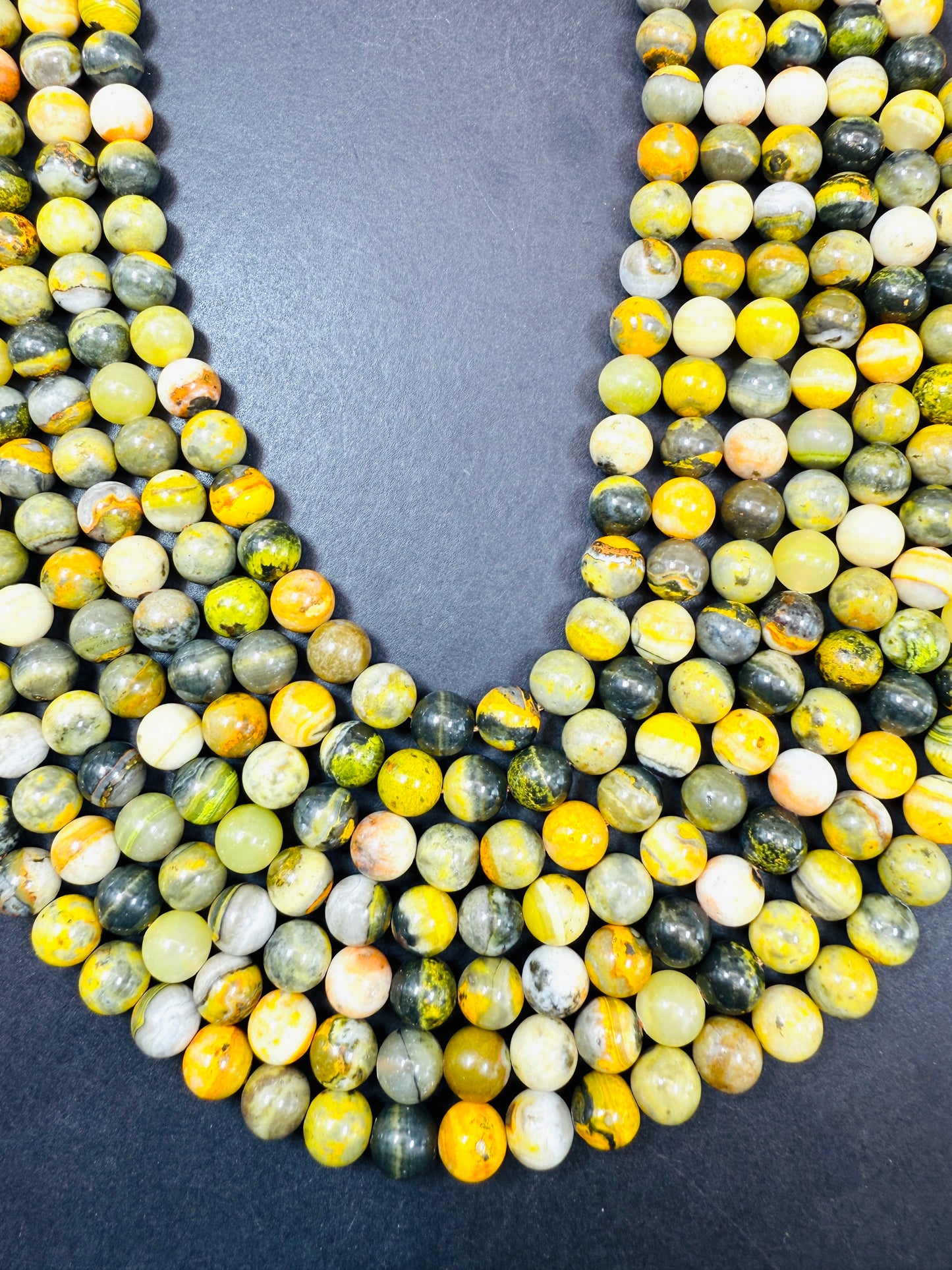 AAA Natural Eclipse stone. 6mm 8mm 10mm round bead . Beautiful natural yellow bee color with brown. High quality Eclipse stone.
