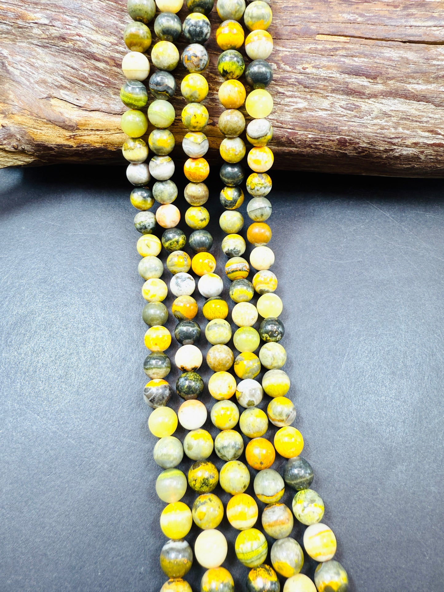 AAA Natural Eclipse stone. 6mm 8mm 10mm round bead . Beautiful natural yellow bee color with brown. High quality Eclipse stone.