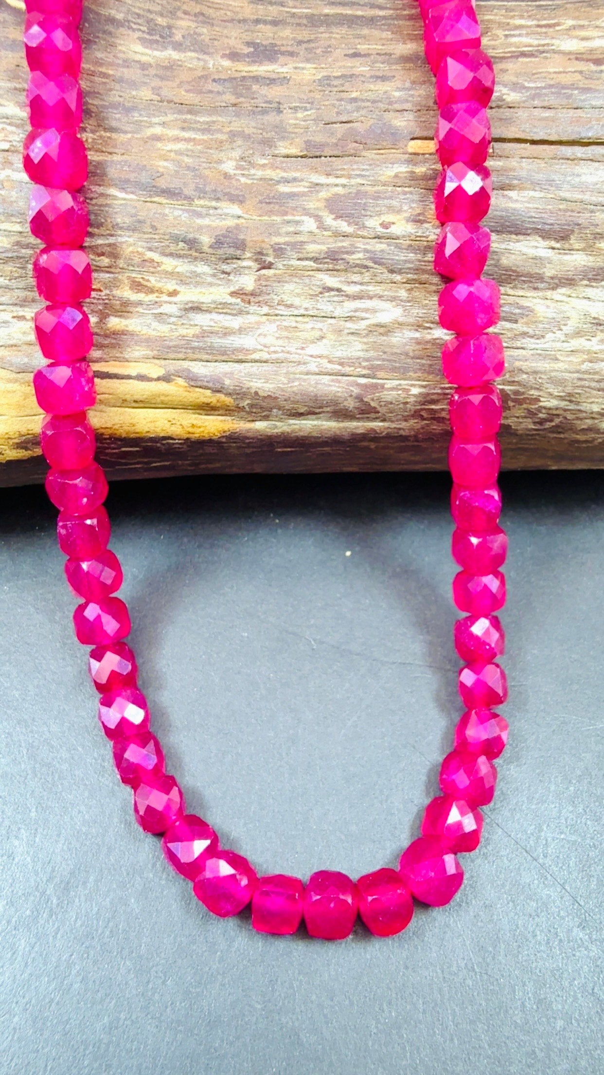 Natural Ruby jade bead . Faceted 6mm cube shape bead. Beautiful natural Hot Pink Ruby Color. Full strand 15.5”