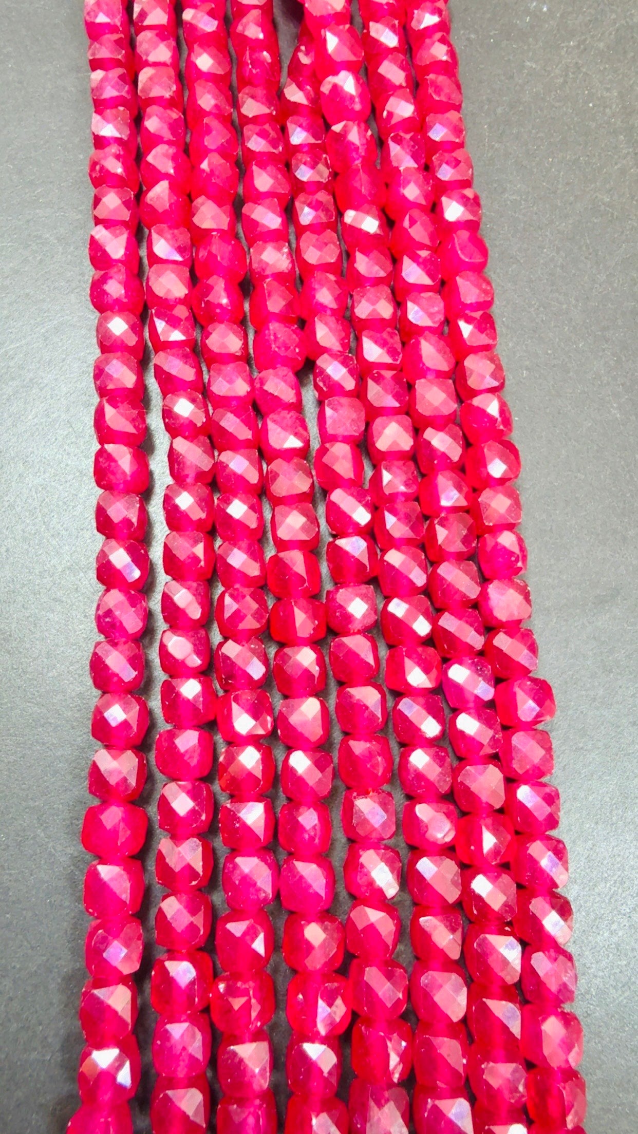 Natural Ruby jade bead . Faceted 6mm cube shape bead. Beautiful natural Hot Pink Ruby Color. Full strand 15.5”