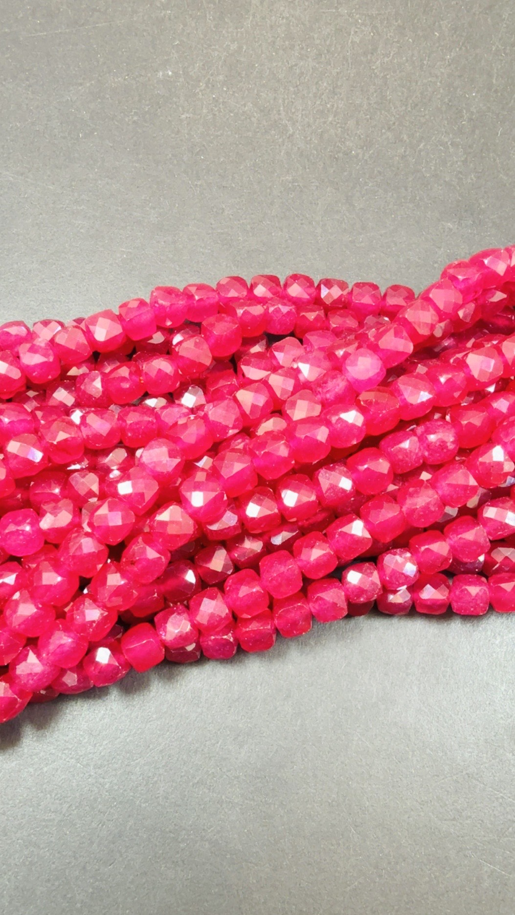Natural Ruby jade bead . Faceted 6mm cube shape bead. Beautiful natural Hot Pink Ruby Color. Full strand 15.5”