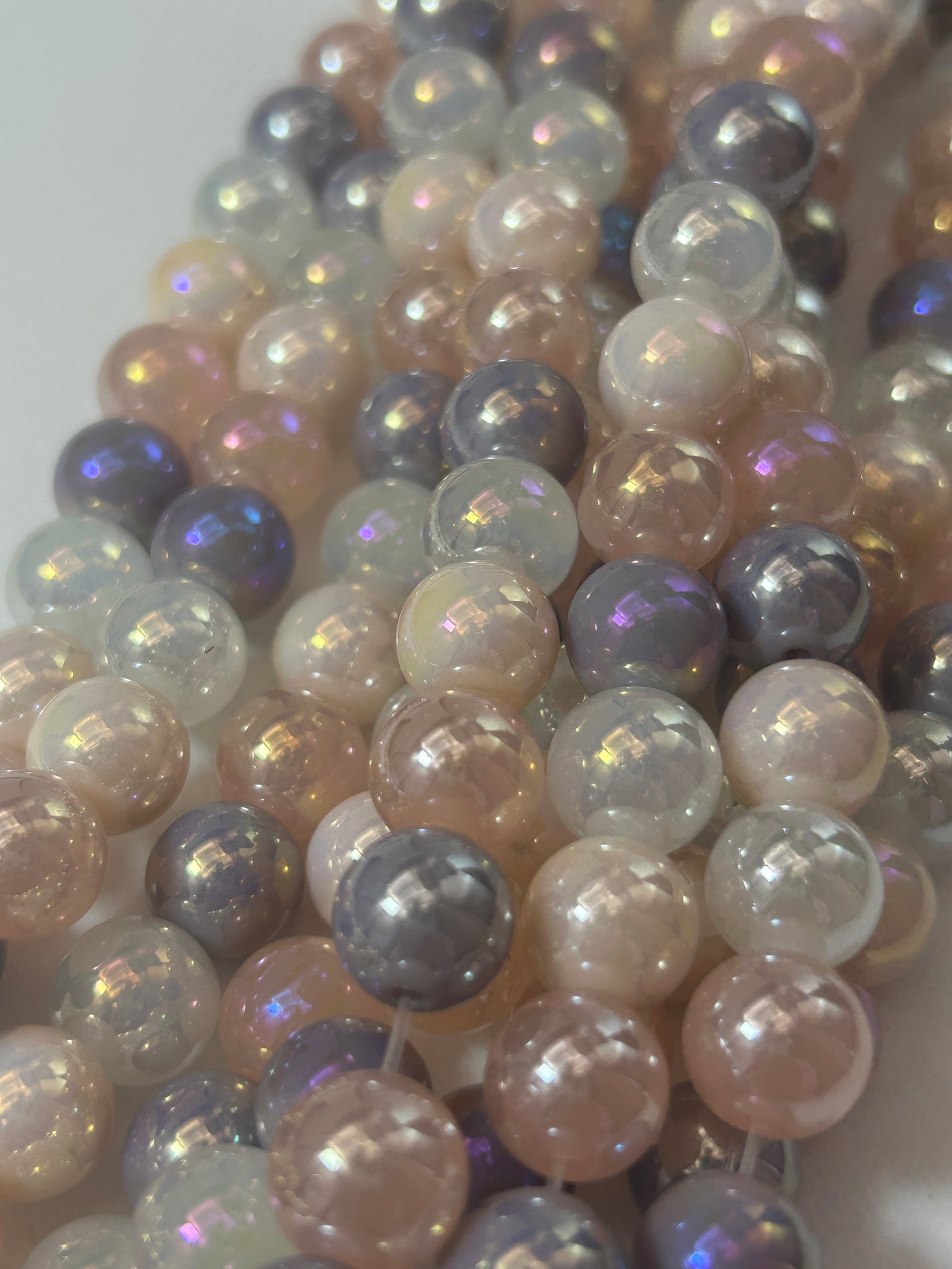 Beautiful Chinese crystal. Smooth Round shape bead. Gorgeous multicolor with iridescent rainbow colors, great quality crystal full strand