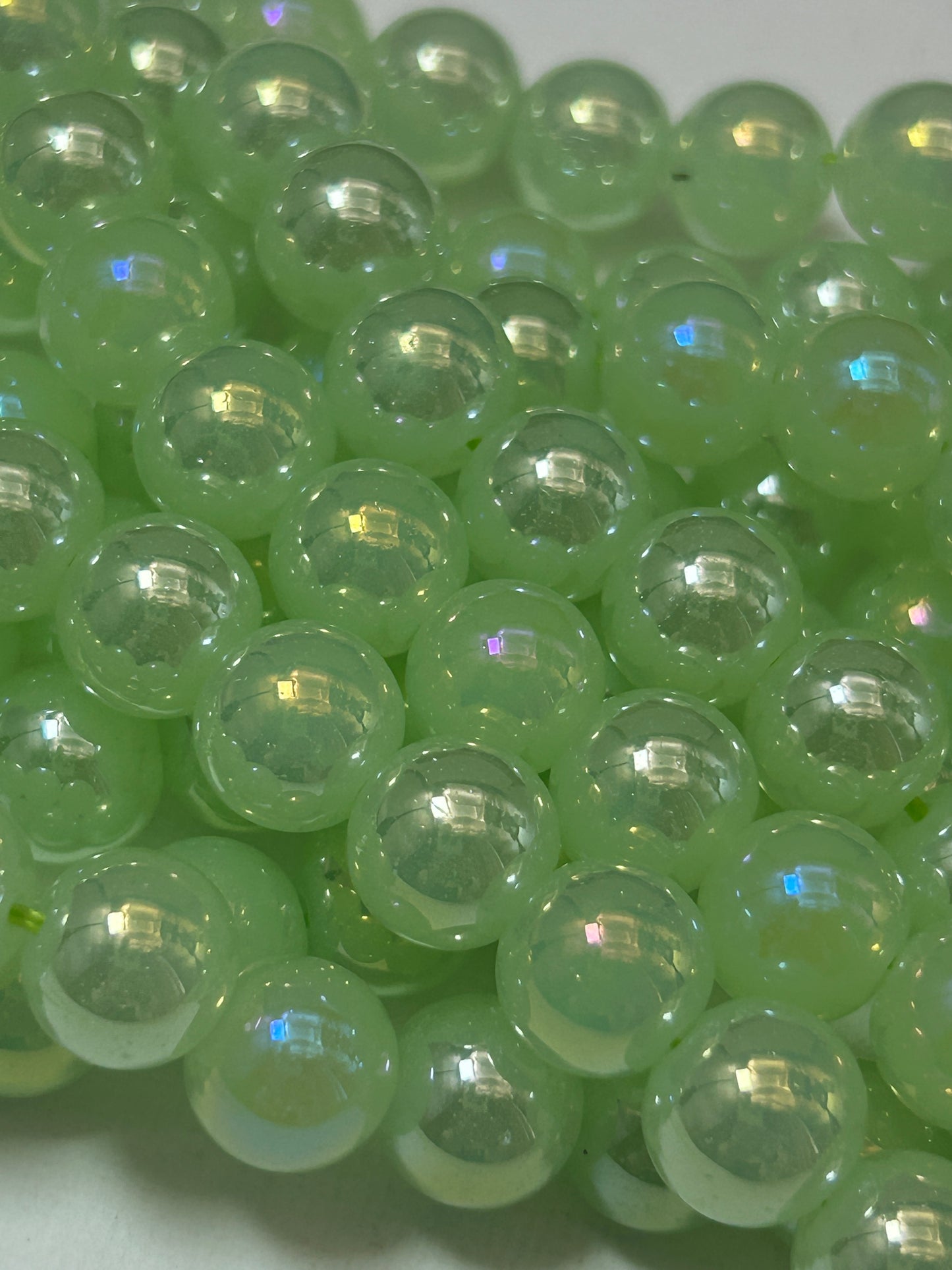 Beautiful Chinese crystal. Smooth Round shape bead. Gorgeous green with iridescent rainbow colors, great quality crystal full strand