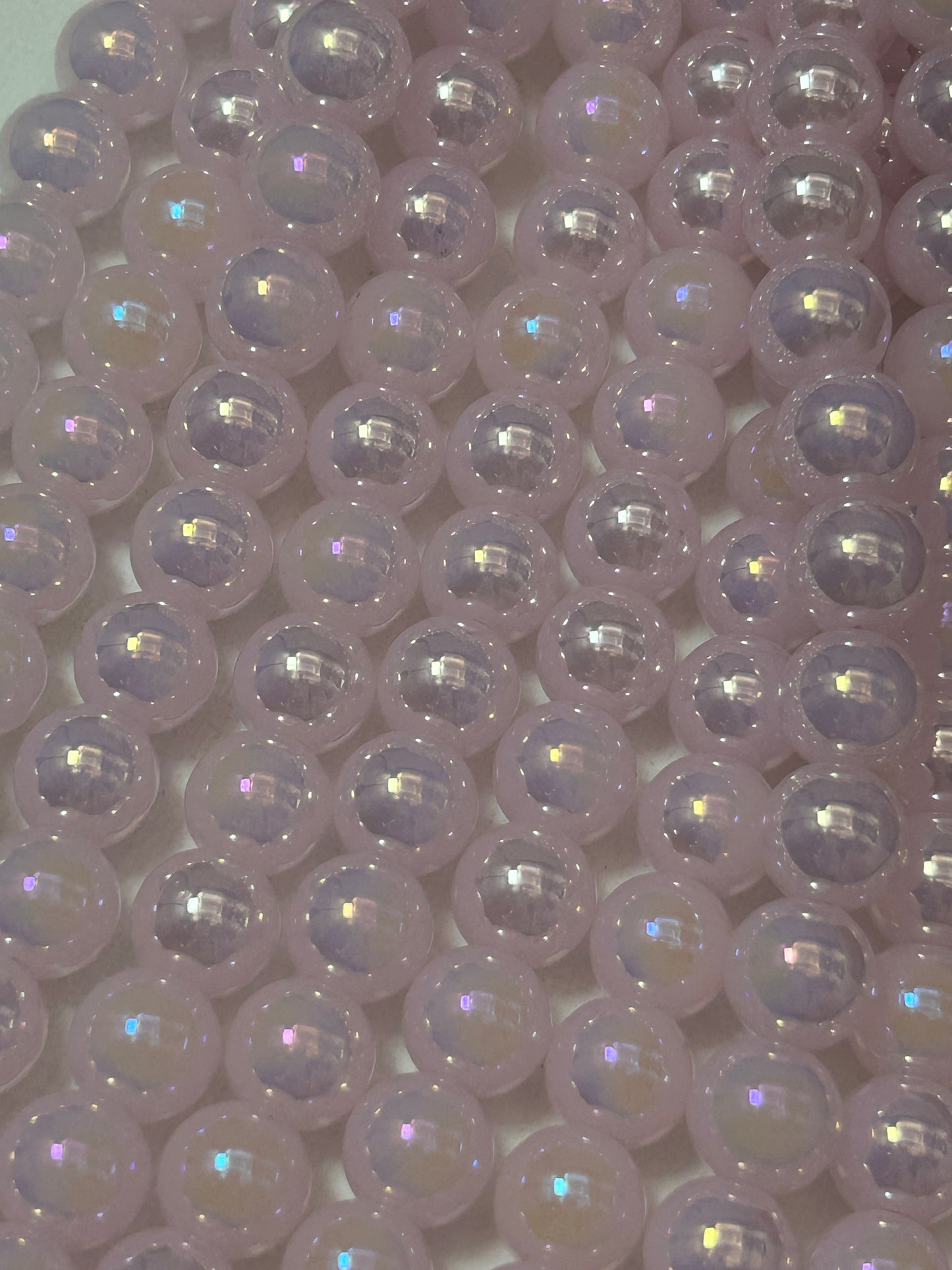 Beautiful Chinese crystal. Smooth Round shape bead. Gorgeous light pink with iridescent rainbow colors, great quality crystal full strand