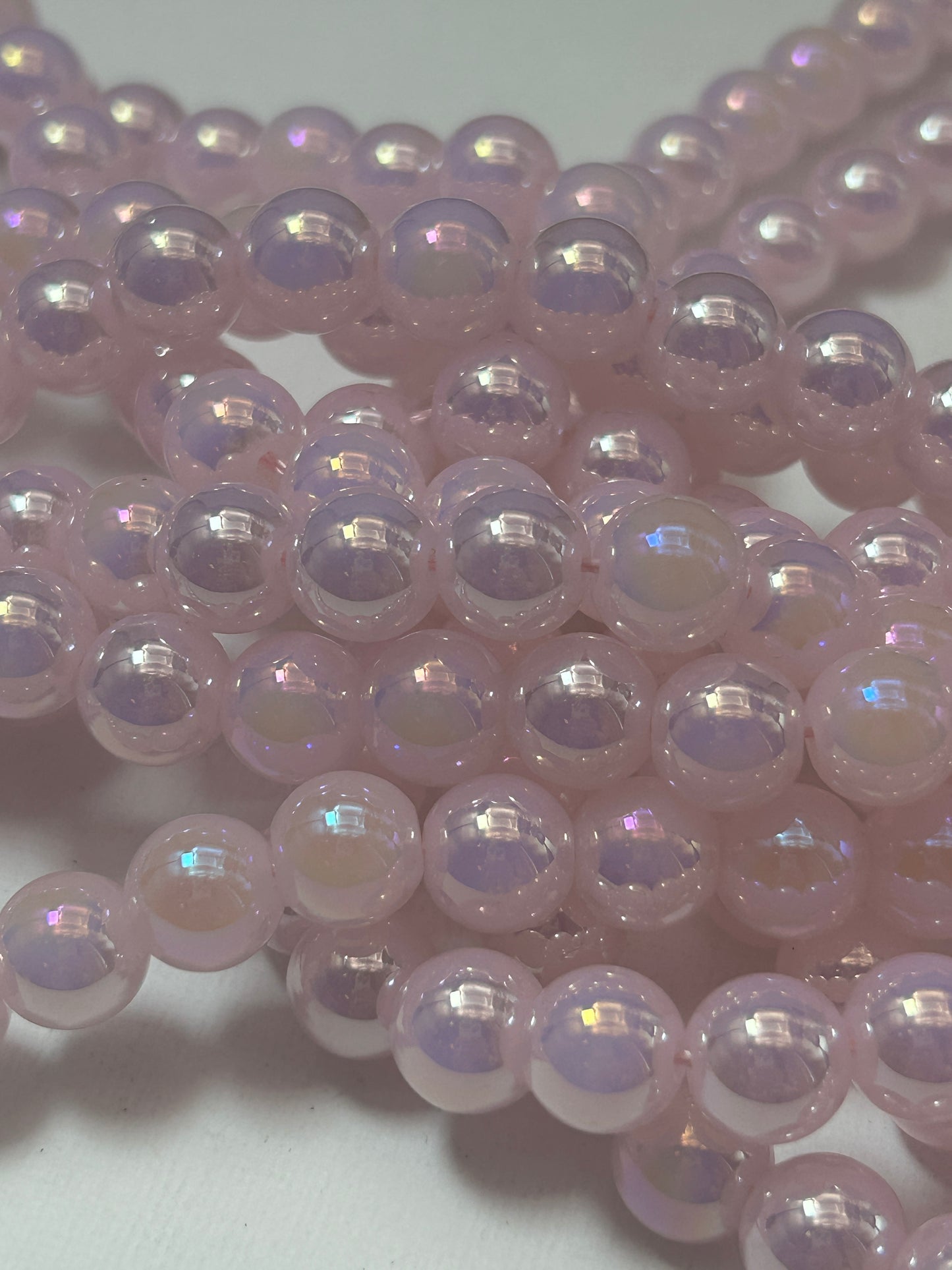 Beautiful Chinese crystal. Smooth Round shape bead. Gorgeous light pink with iridescent rainbow colors, great quality crystal full strand