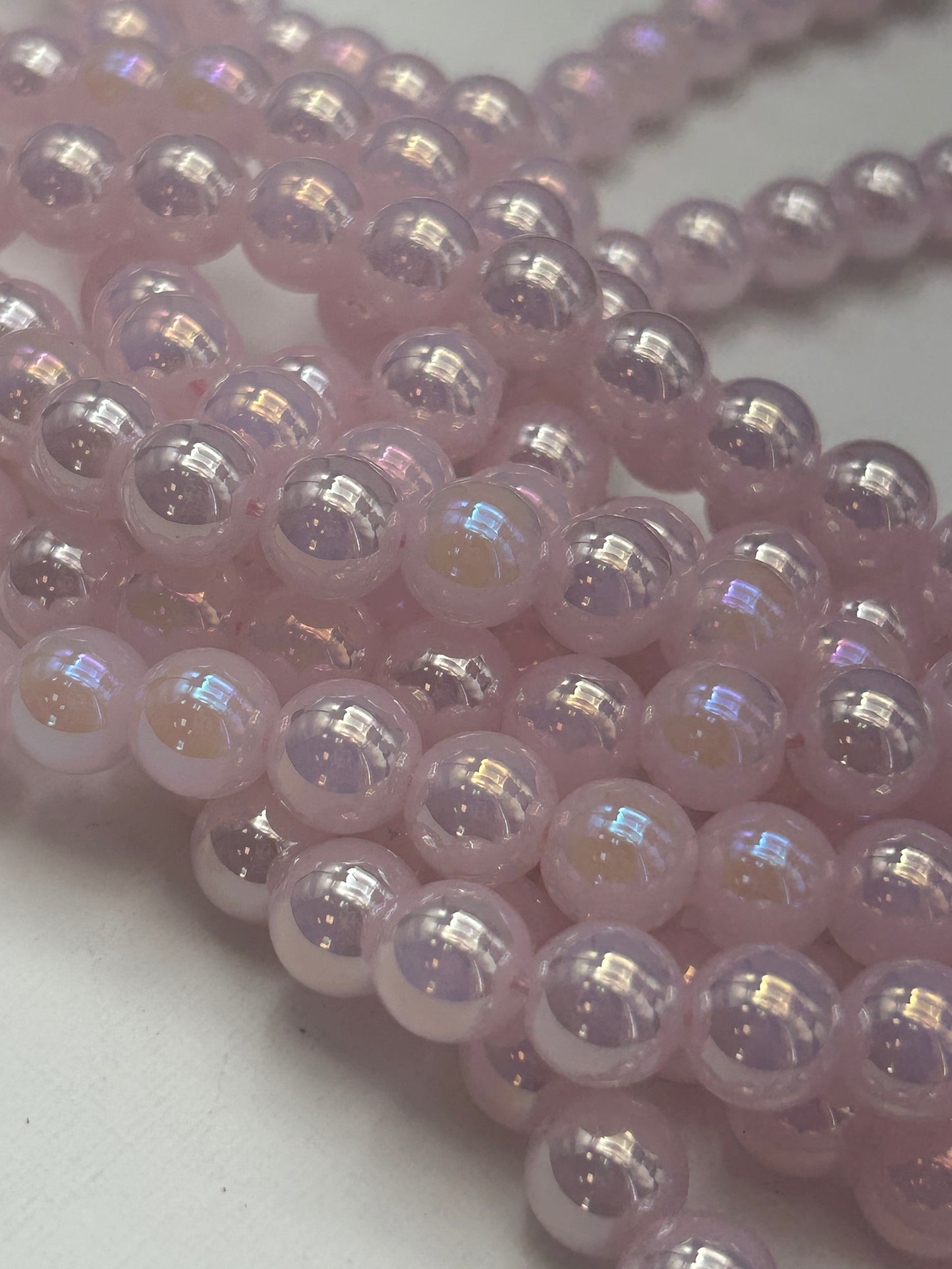 Beautiful Chinese crystal. Smooth Round shape bead. Gorgeous light pink with iridescent rainbow colors, great quality crystal full strand
