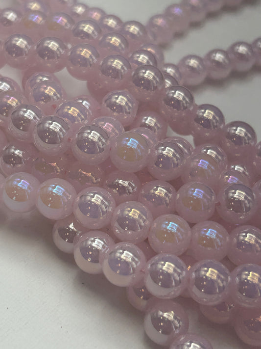 Beautiful Chinese crystal. Smooth Round shape bead. Gorgeous light pink with iridescent rainbow colors, great quality crystal full strand