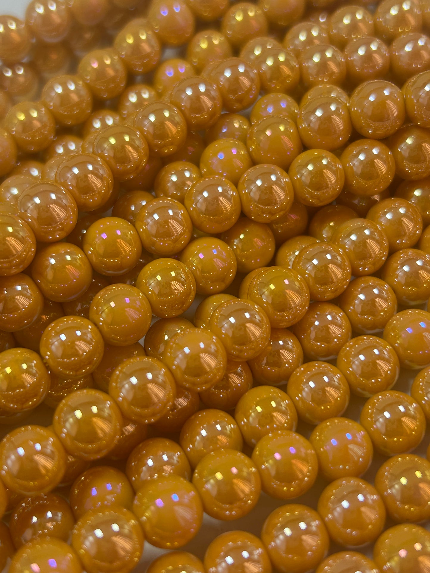 Beautiful Chinese crystal. Smooth Round shape bead. Gorgeous orange with iridescent rainbow colors, great quality crystal full strand