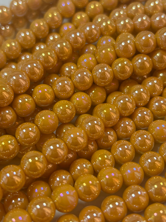 Beautiful Chinese crystal. Smooth Round shape bead. Gorgeous orange with iridescent rainbow colors, great quality crystal full strand
