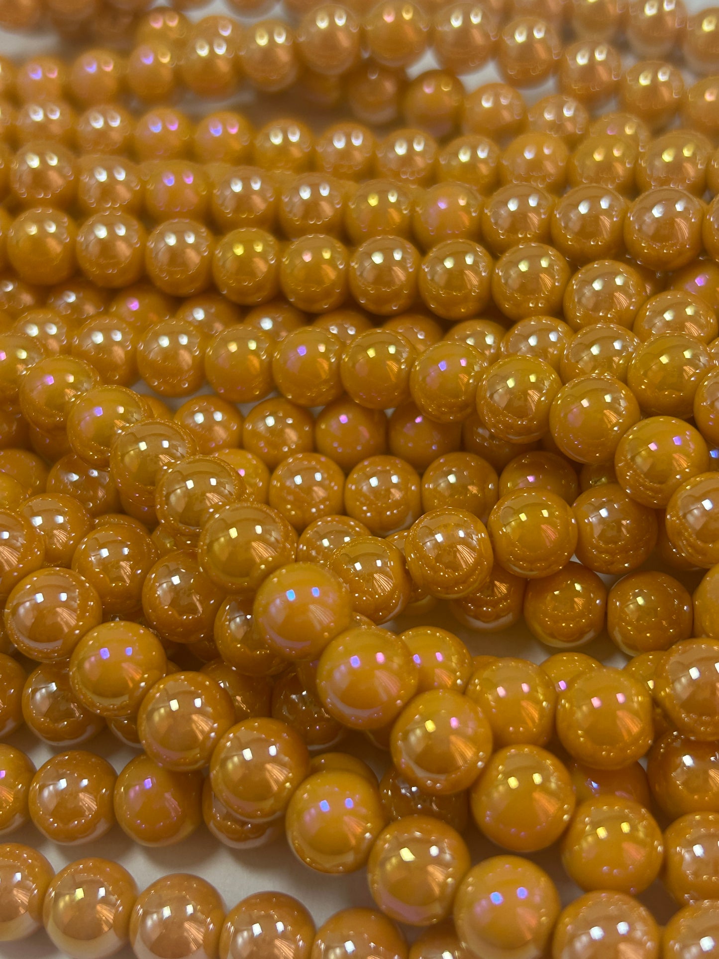 Beautiful Chinese crystal. Smooth Round shape bead. Gorgeous orange with iridescent rainbow colors, great quality crystal full strand