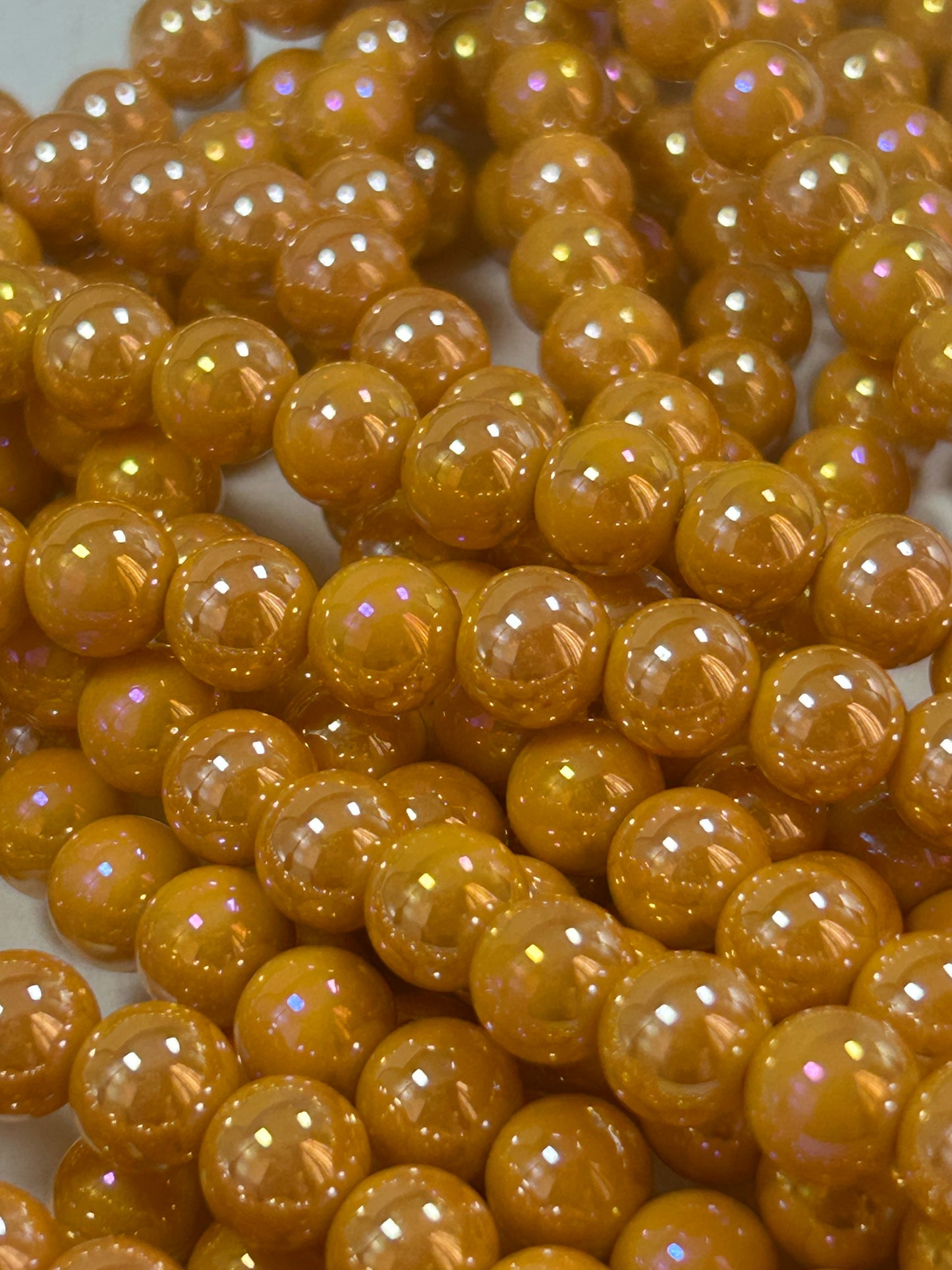 Beautiful Chinese crystal. Smooth Round shape bead. Gorgeous orange with iridescent rainbow colors, great quality crystal full strand