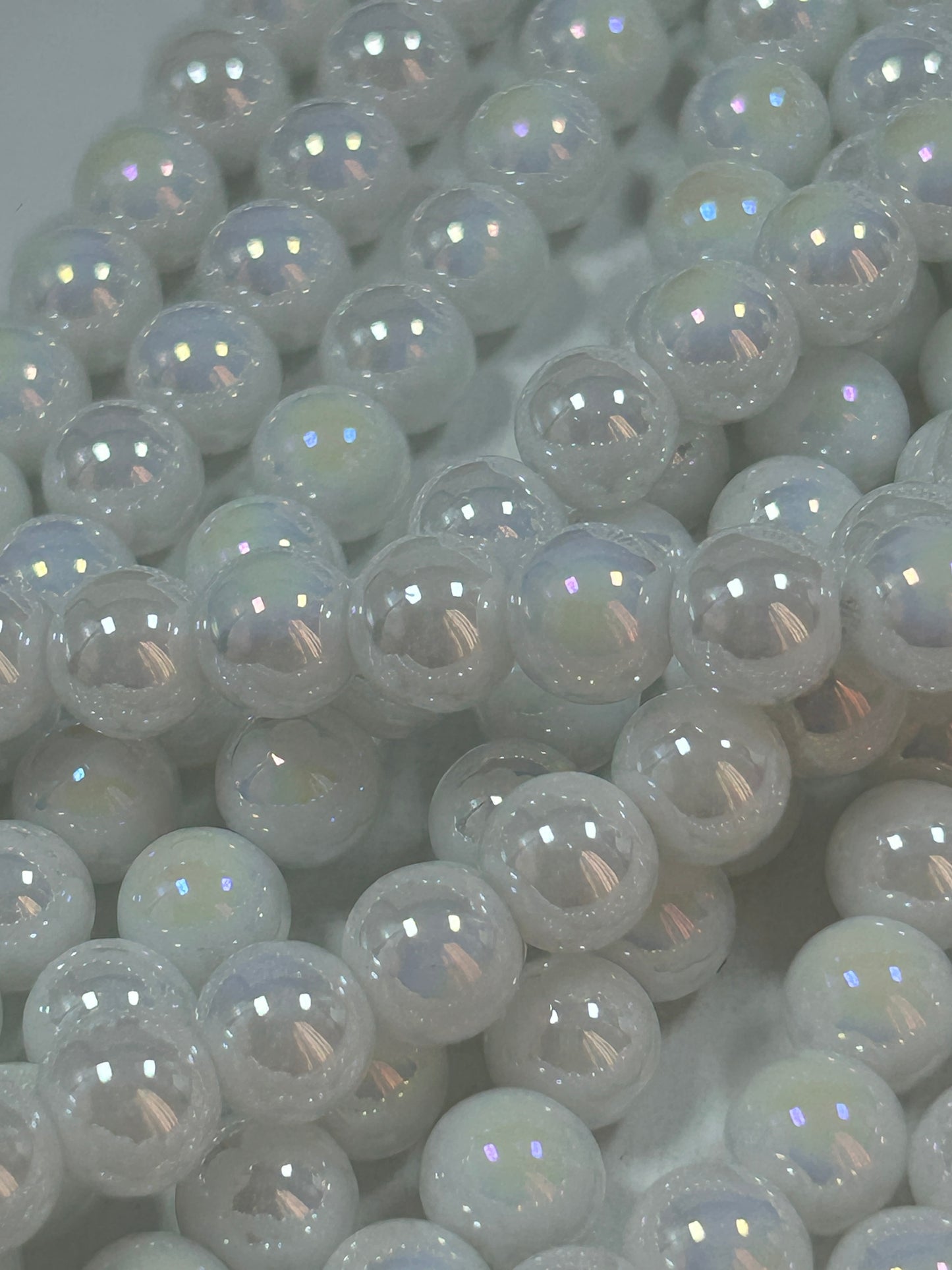 Beautiful Chinese crystal. Smooth Round shape bead. Gorgeous white with iridescent rainbow colors, great quality crystal full strand