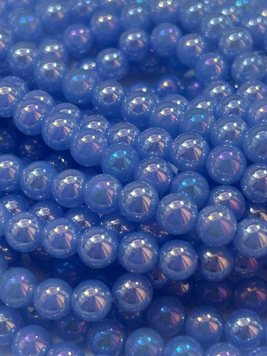 Beautiful Chinese crystal. Smooth Round shape bead. Gorgeous periwinkle with iridescent rainbow colors, great quality crystal full strand
