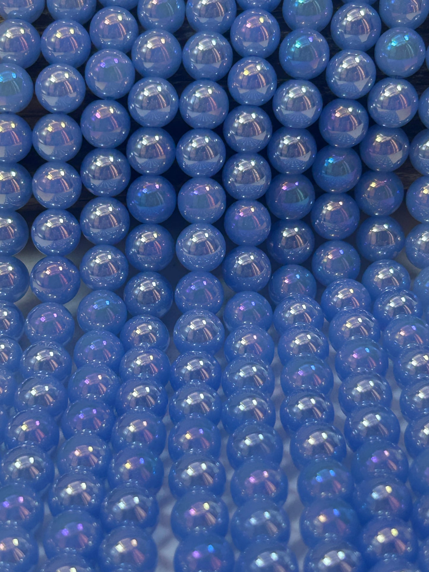 Beautiful Chinese crystal. Smooth Round shape bead. Gorgeous periwinkle with iridescent rainbow colors, great quality crystal full strand