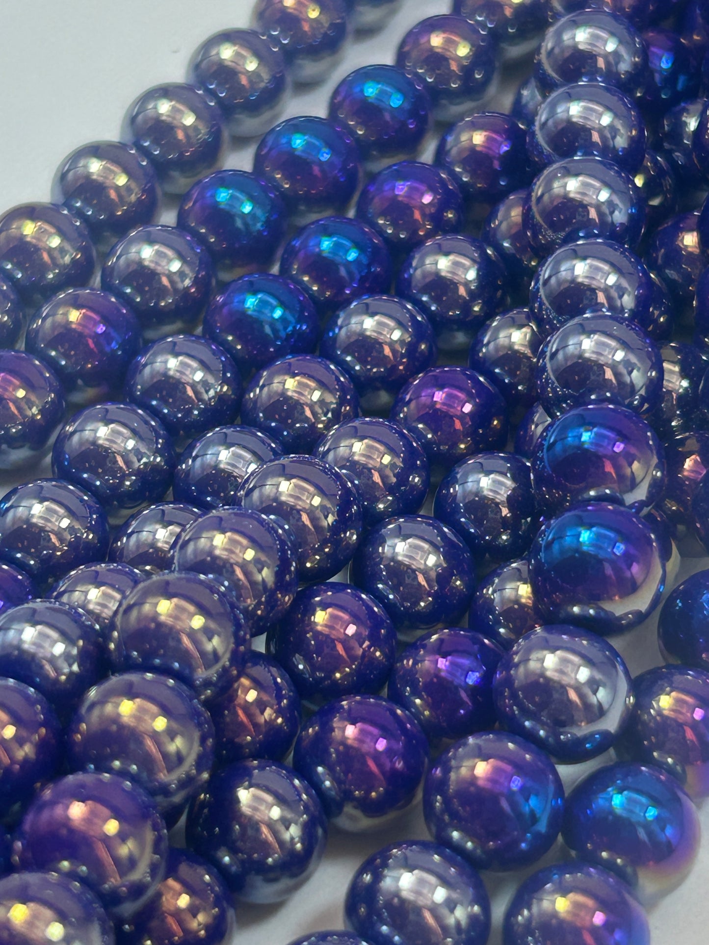 Beautiful Chinese crystal. Smooth Round shape bead. Gorgeous multichromatic purple with rainbow colors, great quality crystal full strand