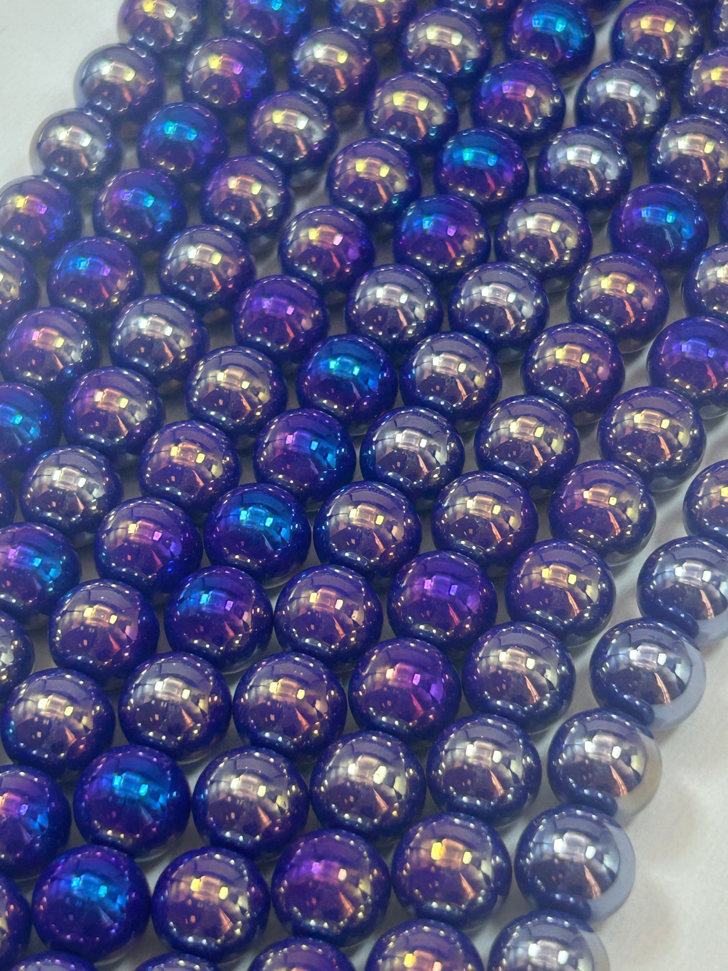 Beautiful Chinese crystal. Smooth Round shape bead. Gorgeous multichromatic purple with rainbow colors, great quality crystal full strand