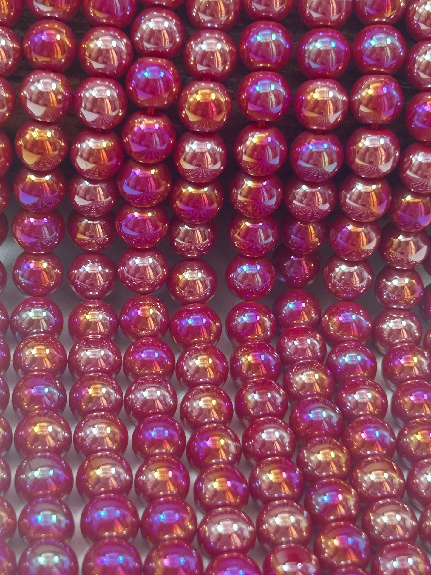 Beautiful Chinese crystal. Smooth Round shape bead. Gorgeous magenta with iridescent rainbow colors, great quality crystal full strand