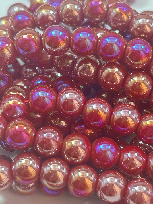 Beautiful Chinese crystal. Smooth Round shape bead. Gorgeous magenta with iridescent rainbow colors, great quality crystal full strand