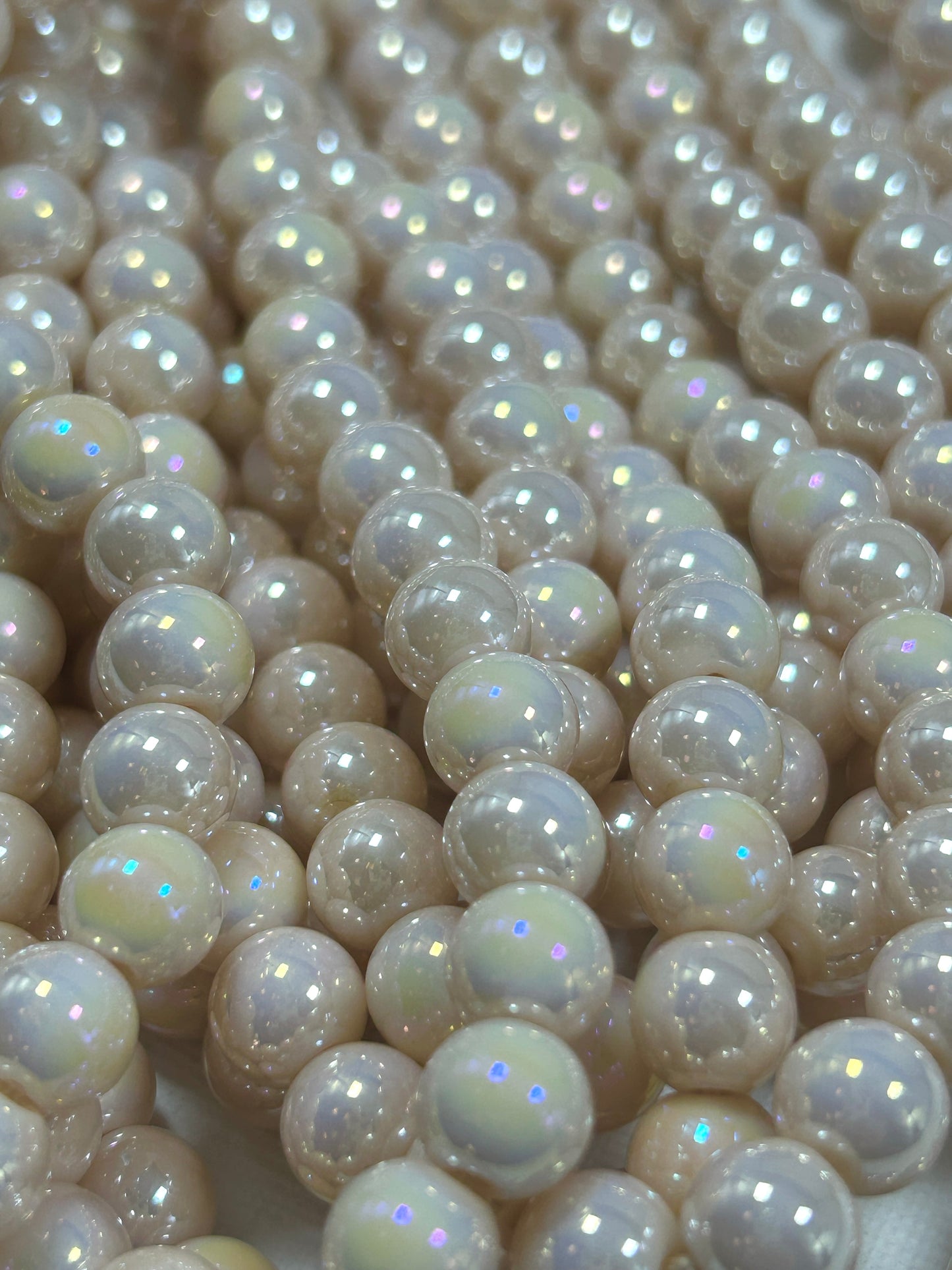 Beautiful Chinese crystal. Smooth Round shape bead. Gorgeous peachy pink with iridescent rainbow colors, great quality crystal full strand