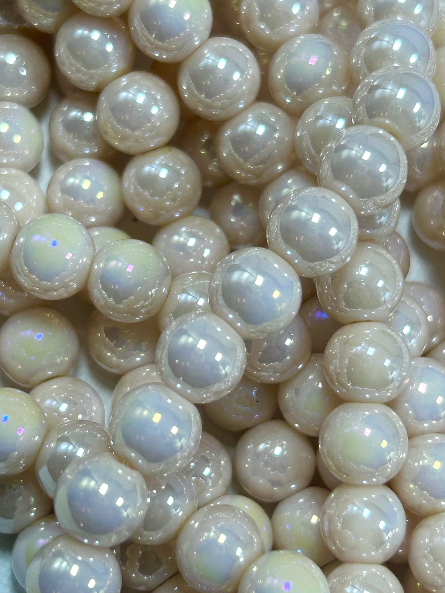 Beautiful Chinese crystal. Smooth Round shape bead. Gorgeous peachy pink with iridescent rainbow colors, great quality crystal full strand