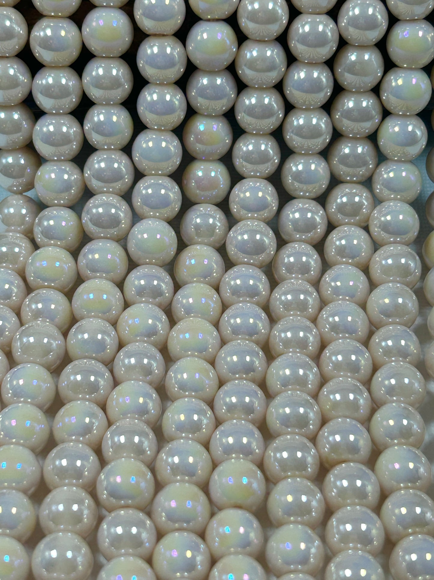Beautiful Chinese crystal. Smooth Round shape bead. Gorgeous peachy pink with iridescent rainbow colors, great quality crystal full strand