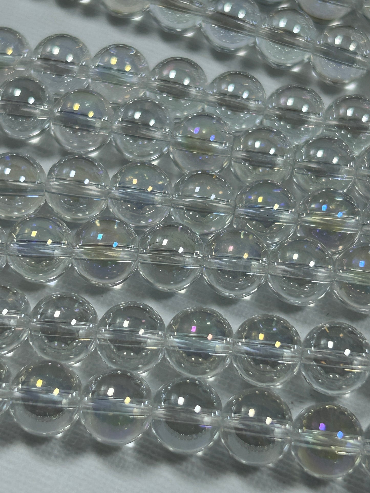 Beautiful Chinese crystal. Smooth Round shape bead. Gorgeous clear with iridescent rainbow colors, great quality crystal full strand