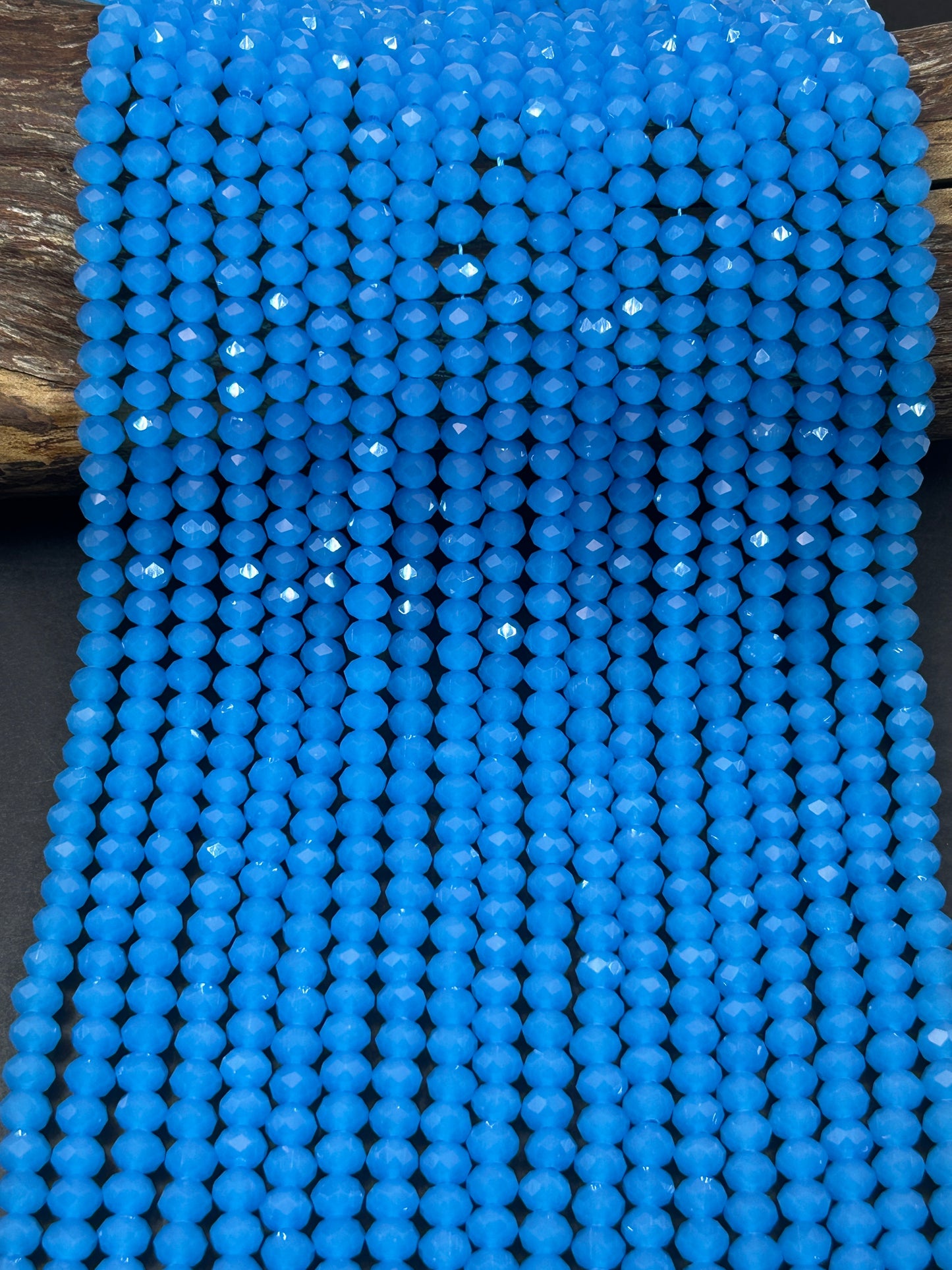 Beautiful Chinese crystal. Faceted Rondelle shape bead. Gorgeous aquamarine blue, iridescent rainbow color. Great quality glass full strand