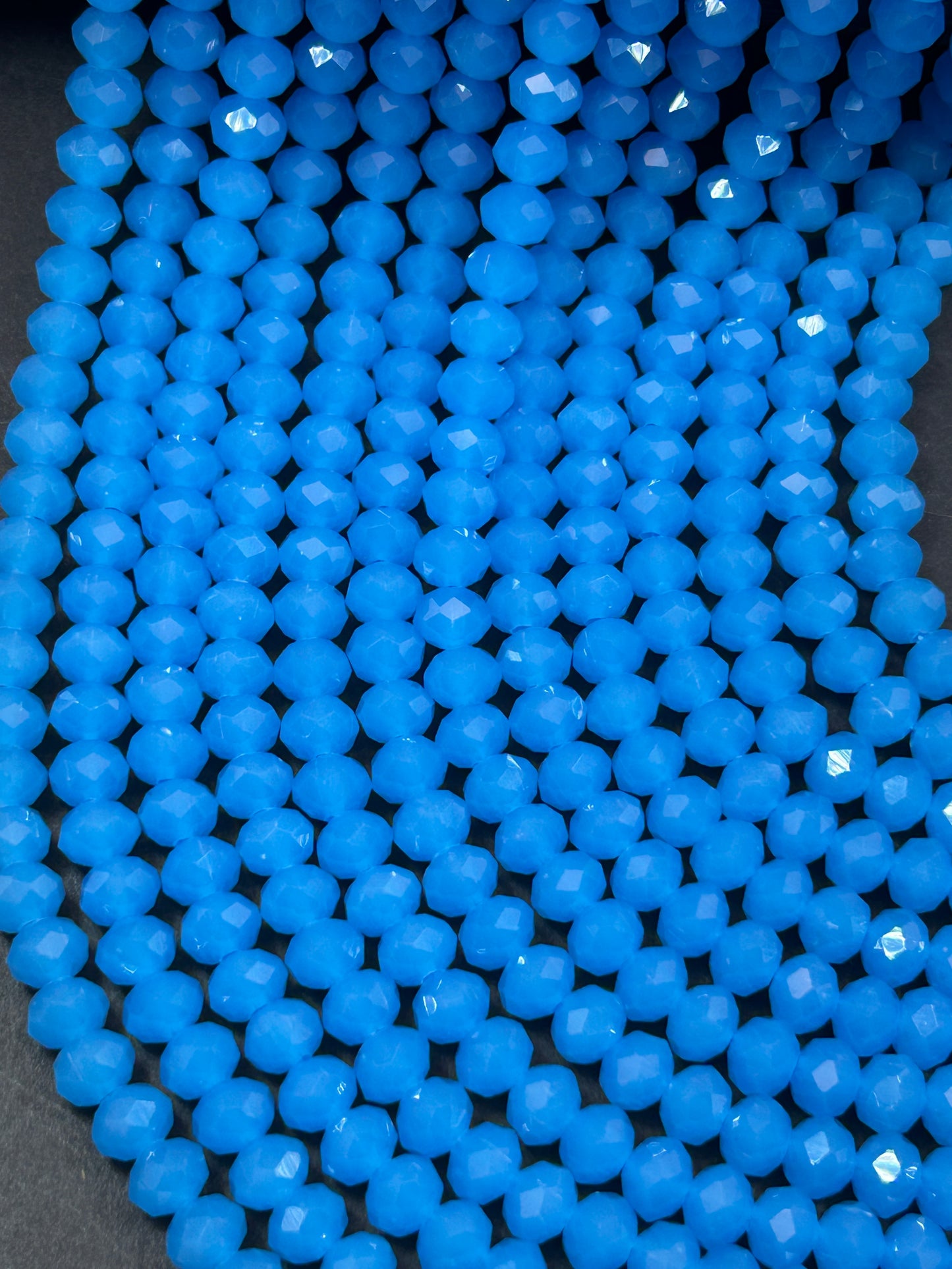 Beautiful Chinese crystal. Faceted Rondelle shape bead. Gorgeous aquamarine blue, iridescent rainbow color. Great quality glass full strand